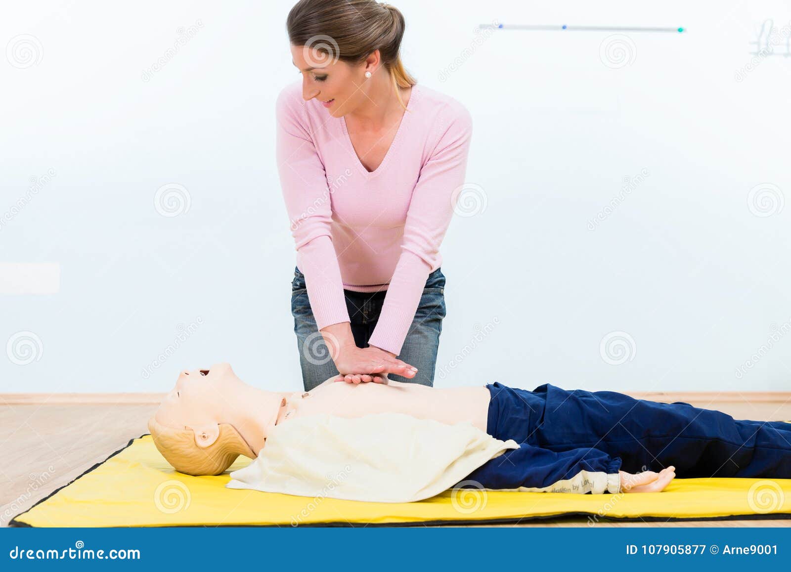 Woman In First Aid Course Practicing Heart Massage Stock Image Image