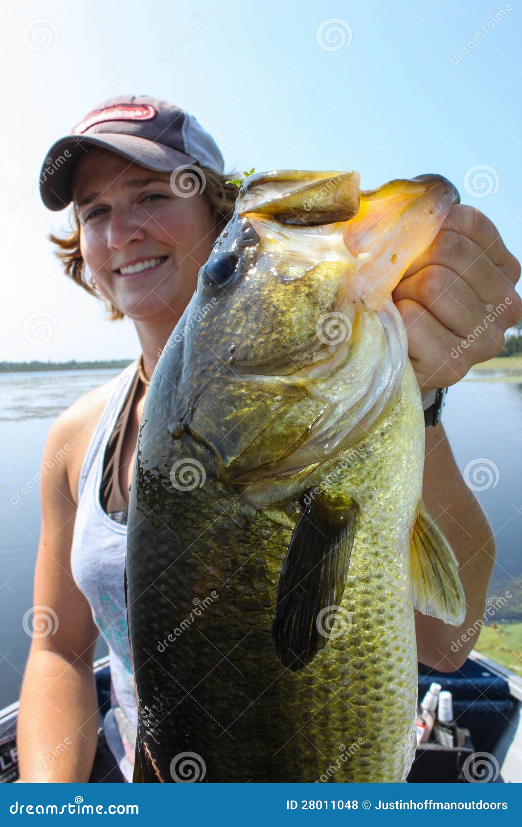 woman fishing large mouth bass attractive