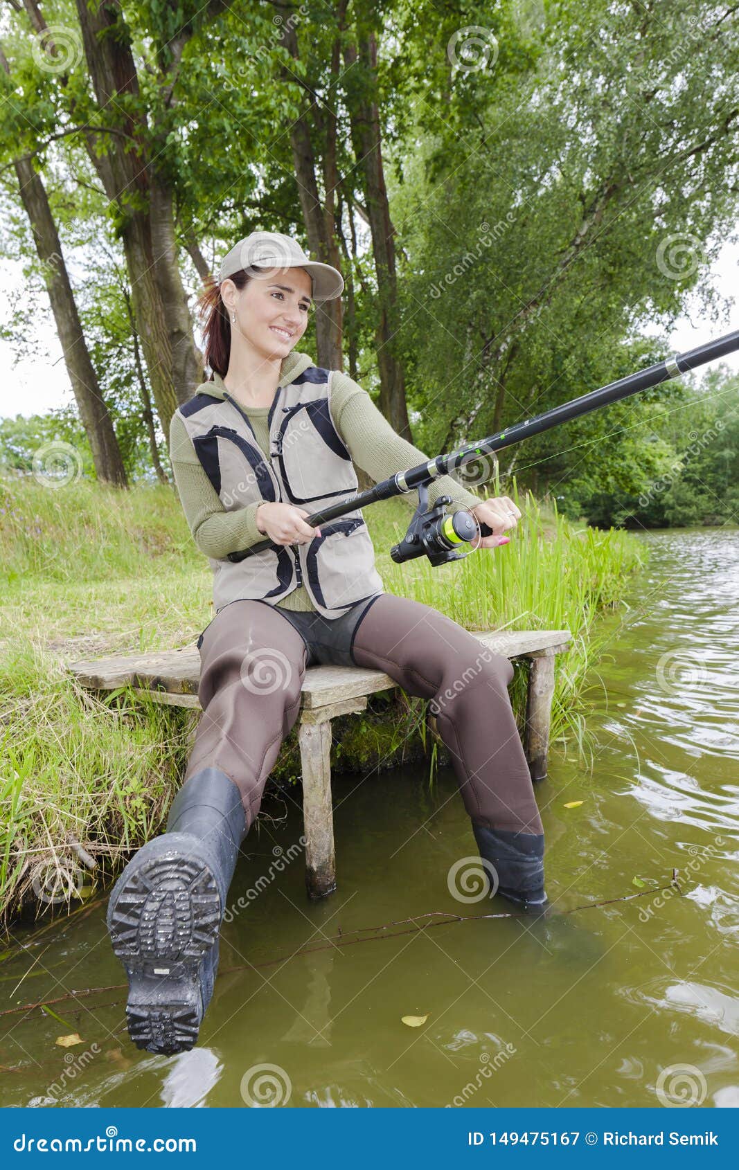 Woman Fishing in the River in Spring Stock Image - Image of river
