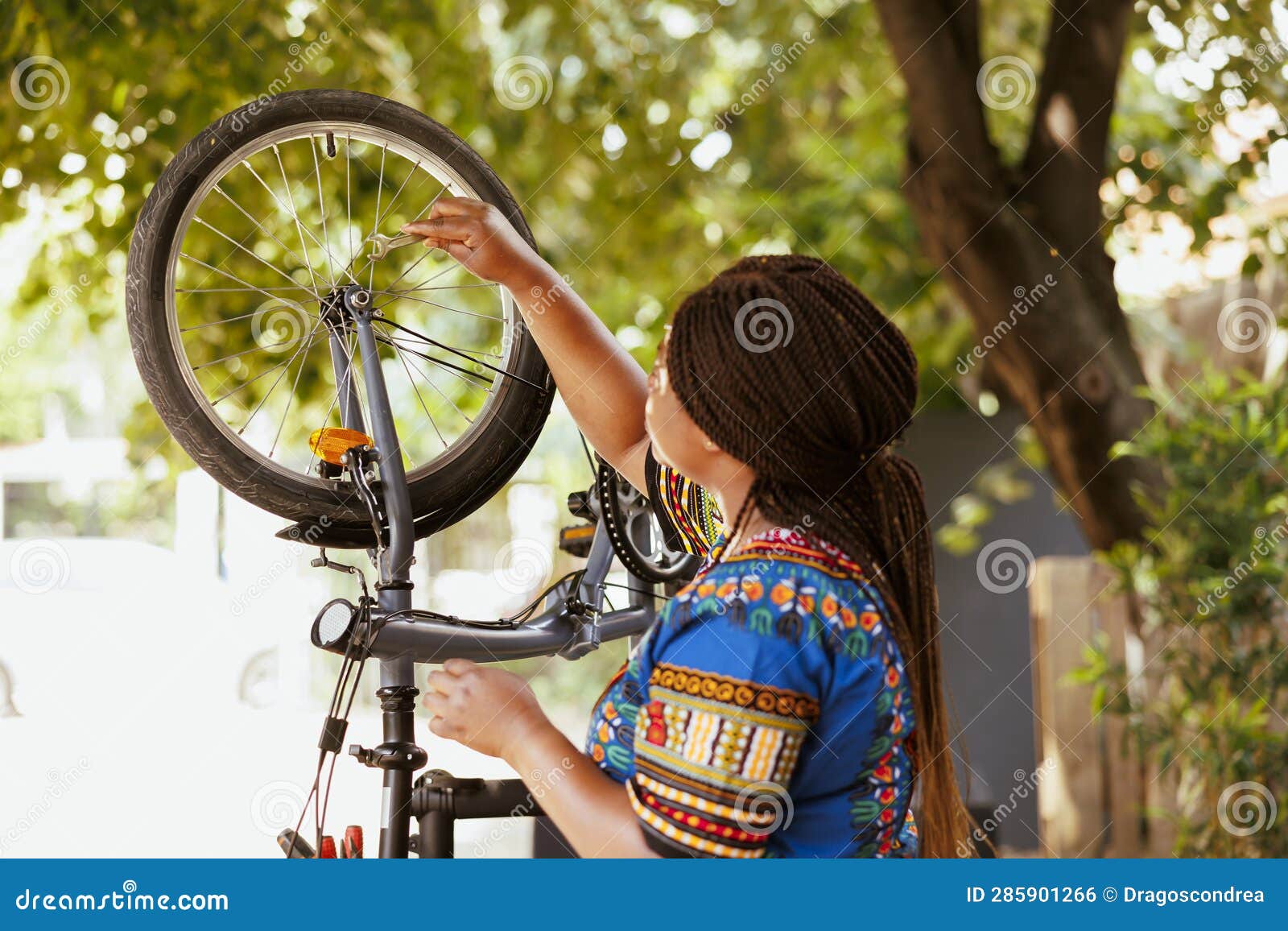 Woman Fixing Damaged Bicycle Wheel Stock Photo Image of damaged