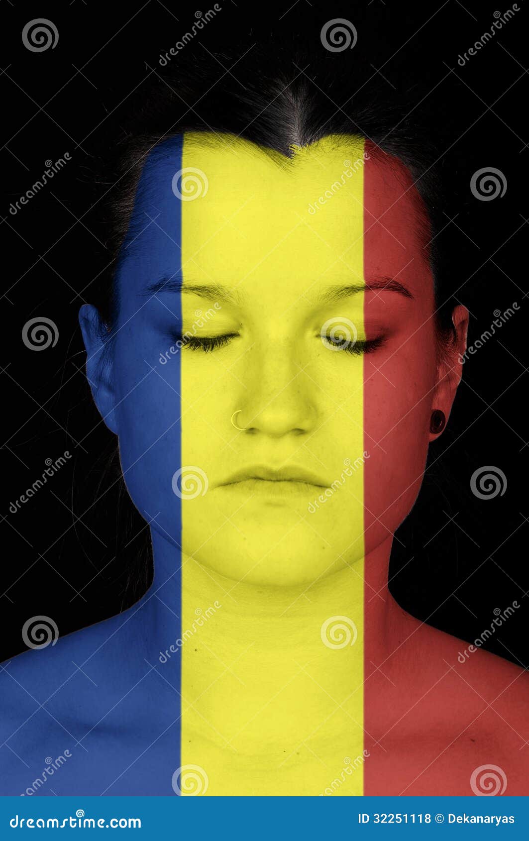 woman with the flag of rumania painted on her face.