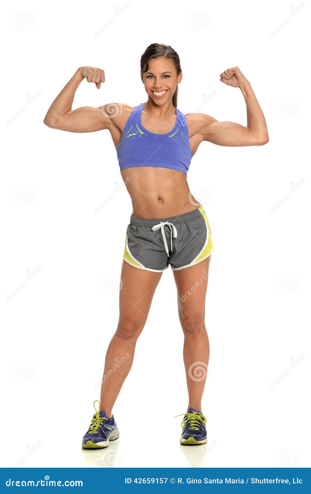 Young Beautiful Sporty Woman Flexing Biceps Closeup on Gray Background  Stock Photo - Alamy