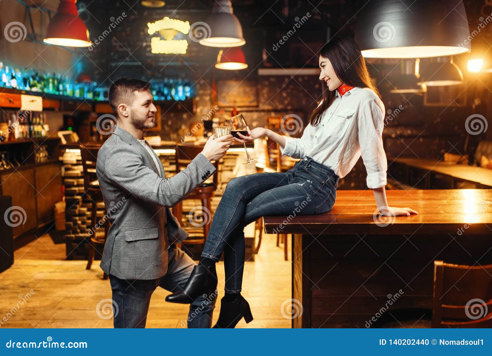 woman flirting with man, couple at bar counter