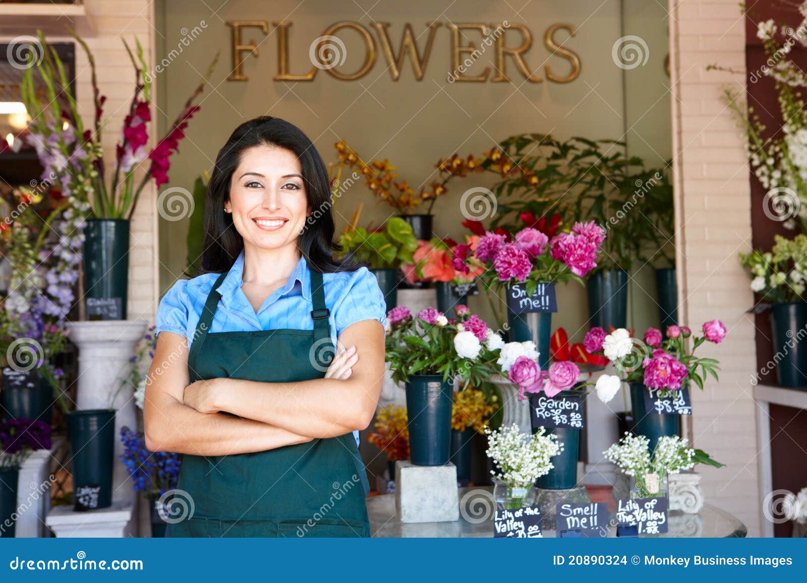 woman florist standing outside shop