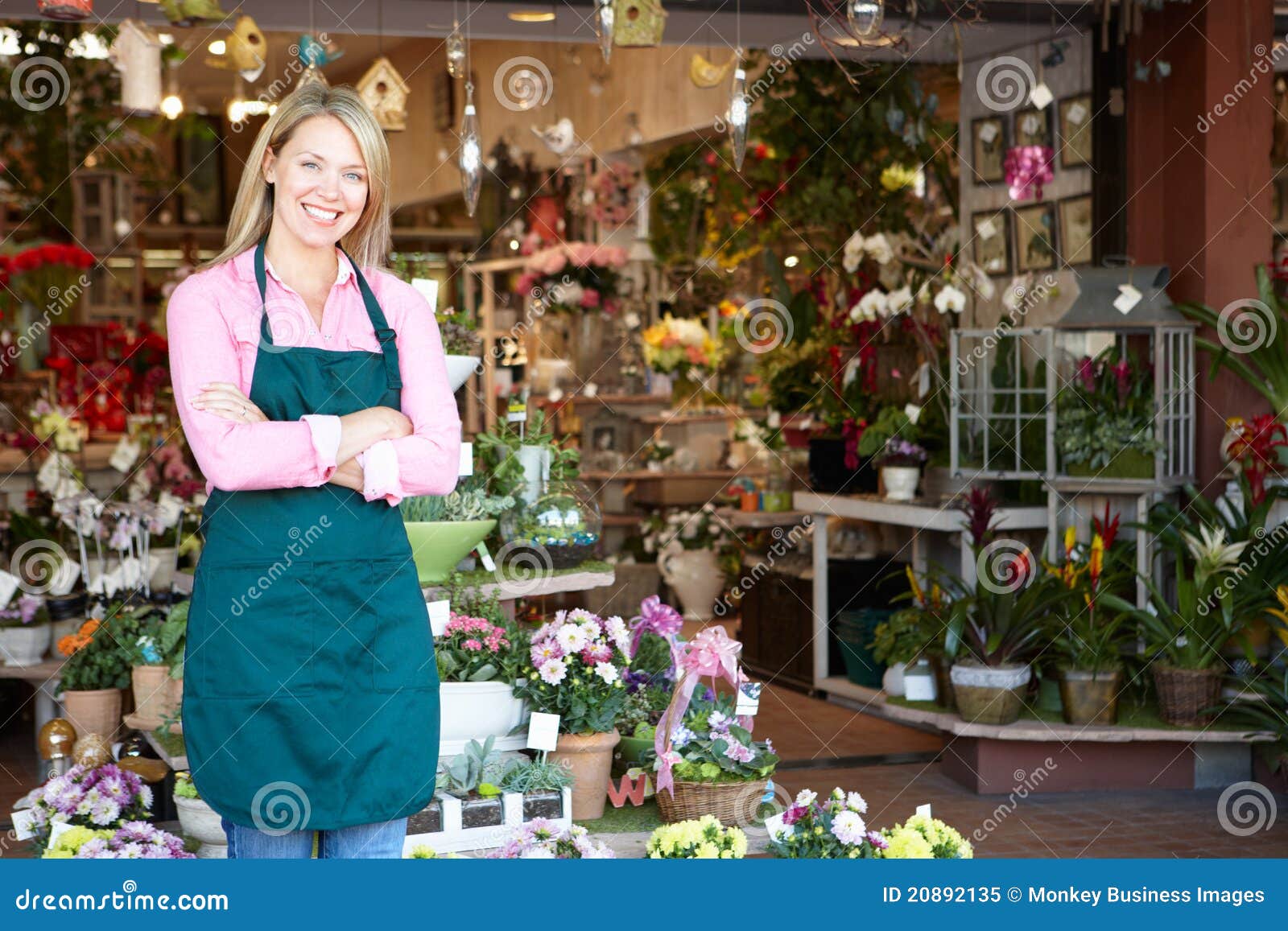 woman florist standing outside shop