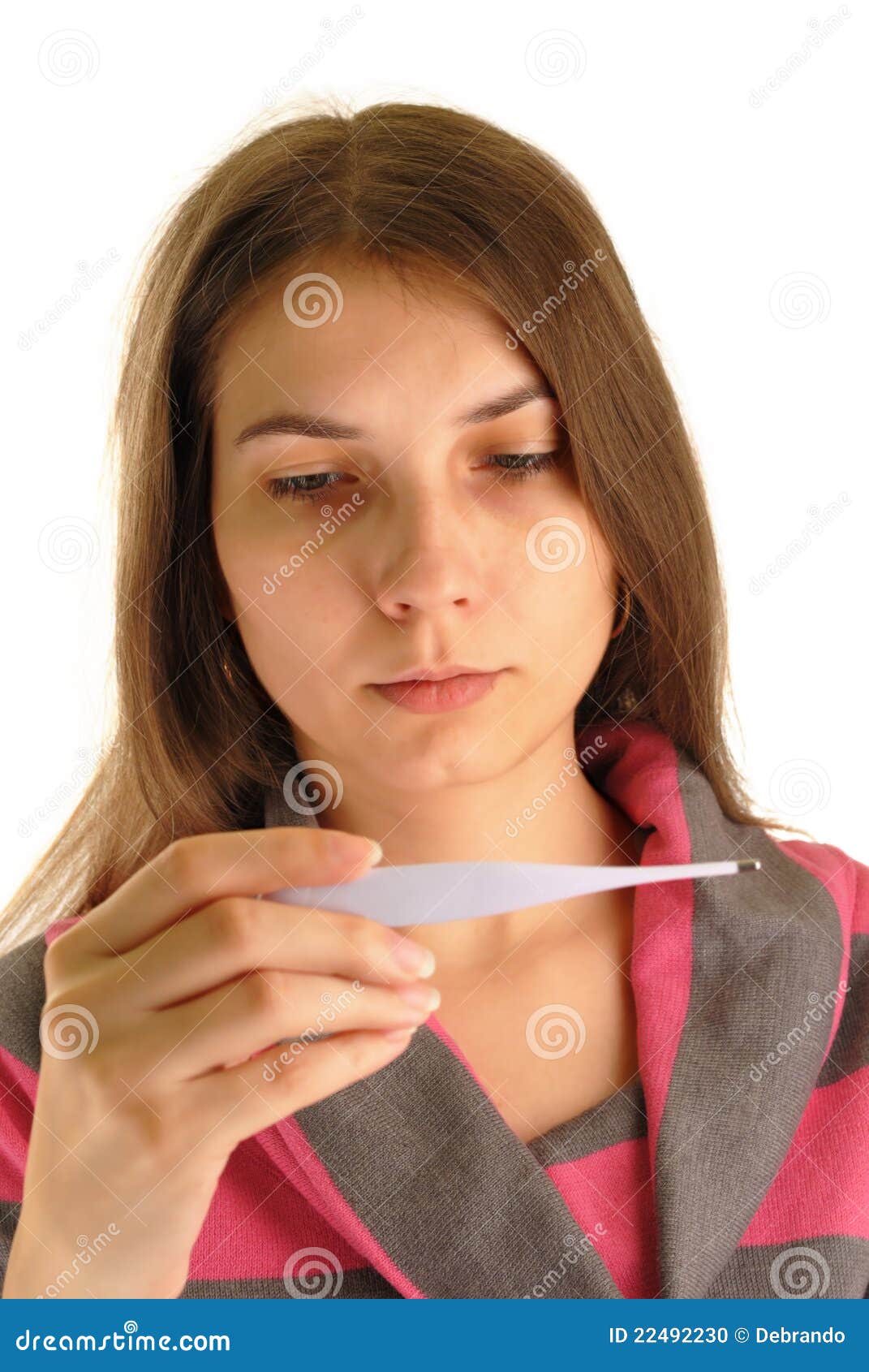 Woman with flu,no makeup. Young woman having a flu,reading a thermometer,no makeup.