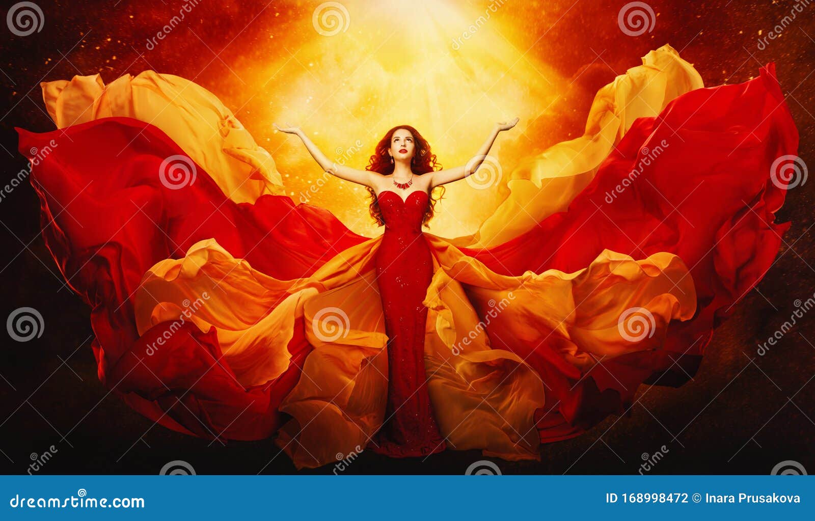 woman in flying dress raised arms to mystery light, girl in red gown