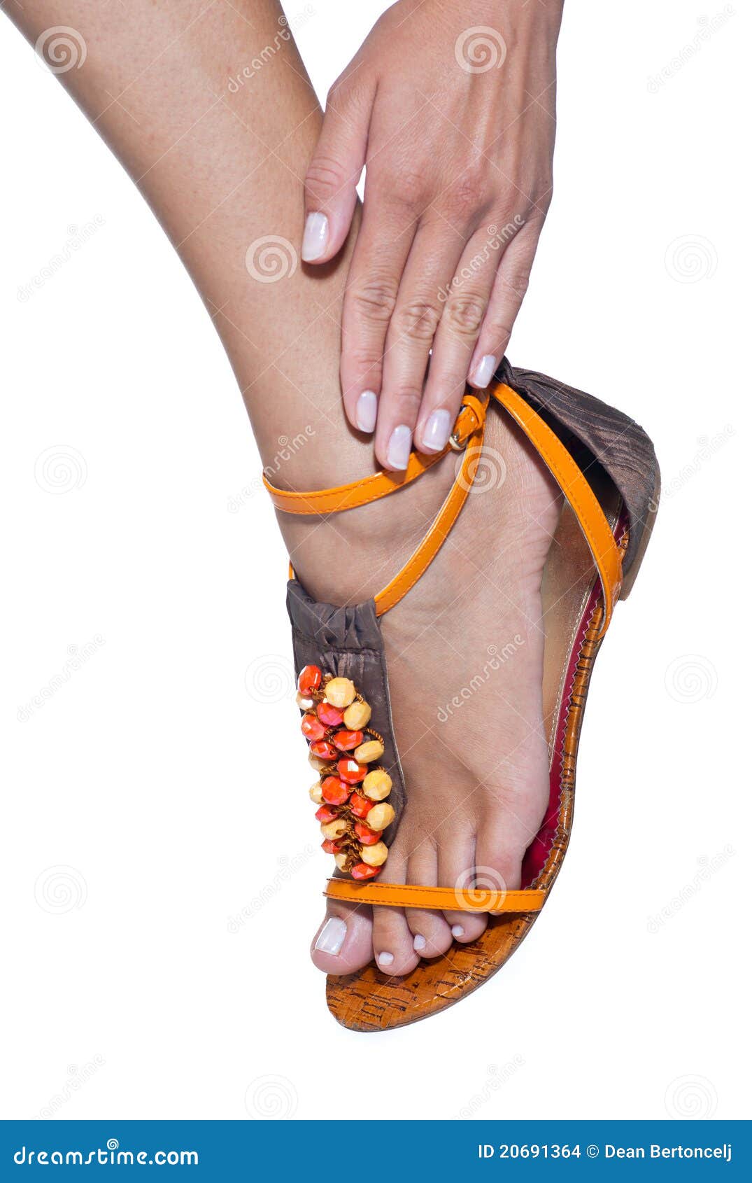 Woman foot touched by hand stock photo. Image of summer 20691364