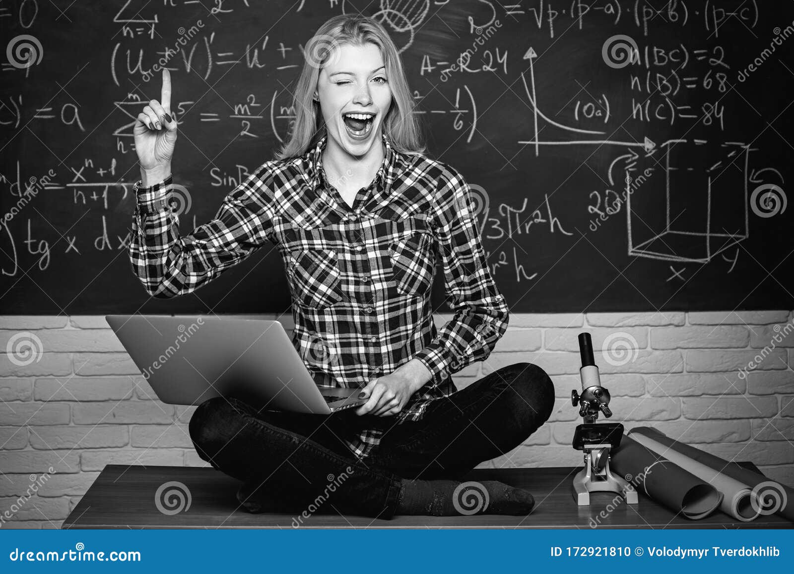 woman freelancer with good mood using laptop computer. student help homework. knowledge day.