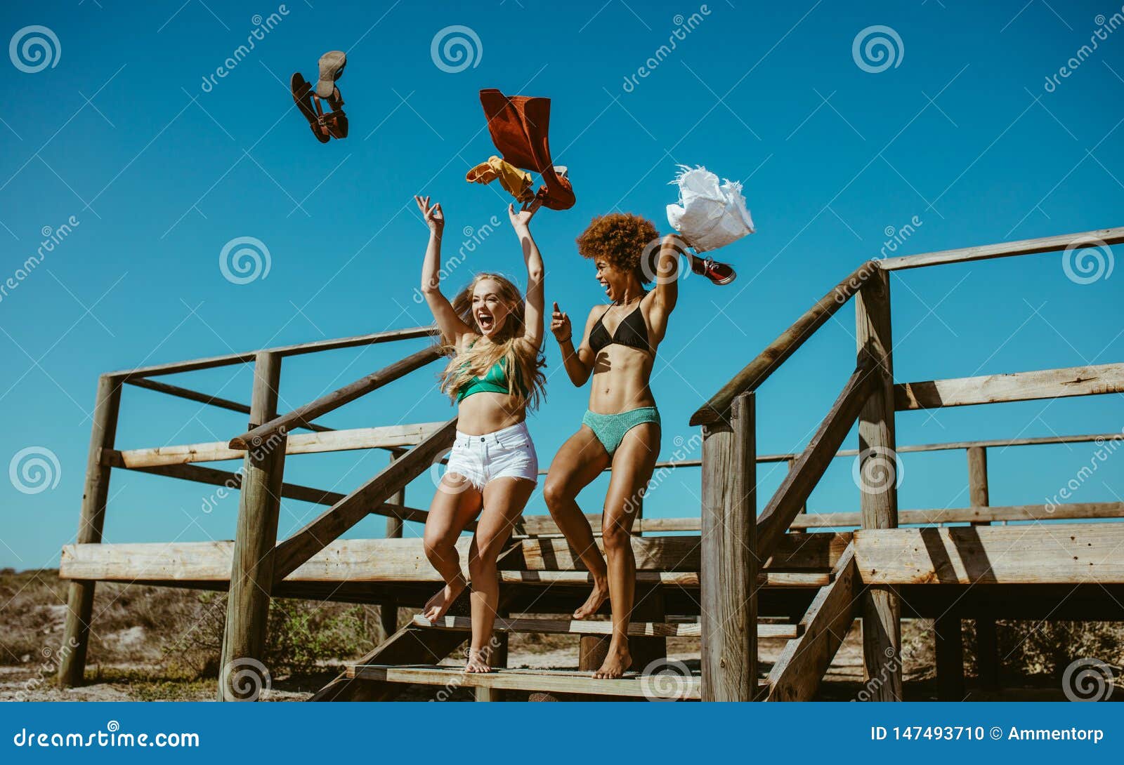 Taking Off Clothes Beach Stock Photos - Free & Royalty-Free Stock Photos  from Dreamstime