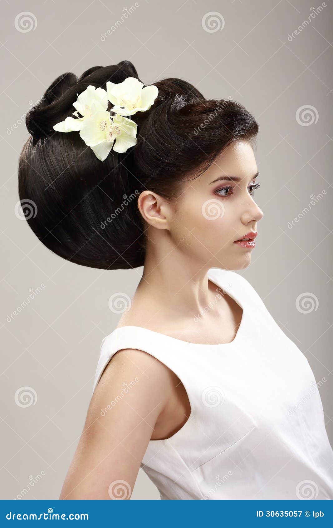 Woman With Futuristic Hairstyle And Orchid Stock Image ...