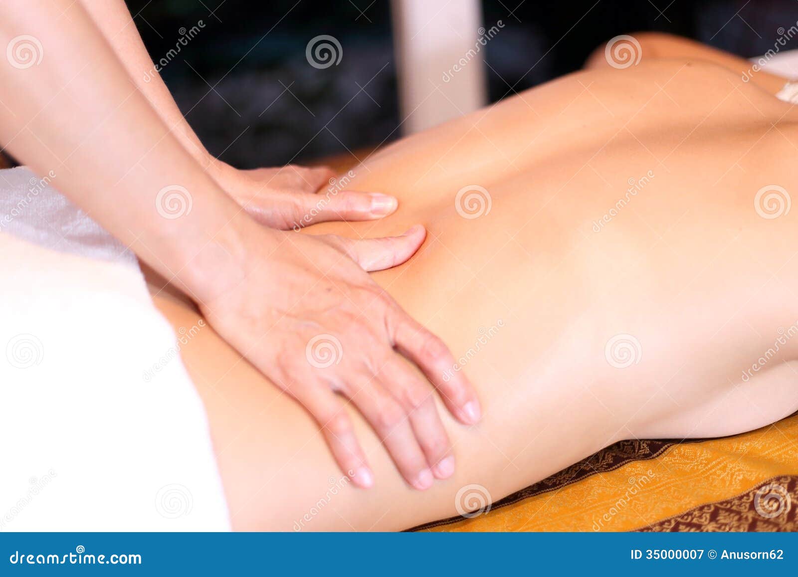 Lower back massage - Stock Image - C022/3243 - Science Photo Library