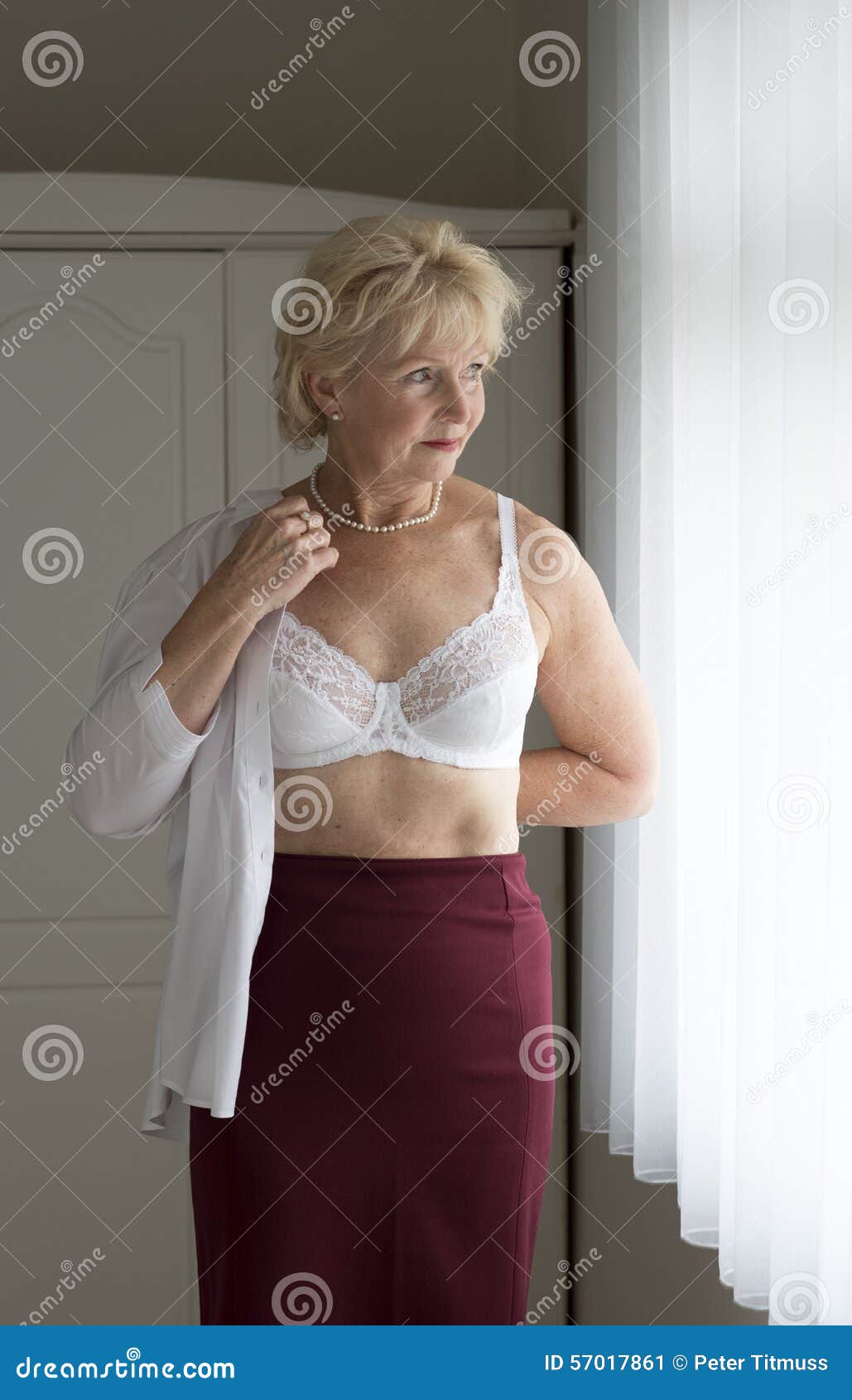 Woman getting dressed stock image. Image of woman, putting - 57017861