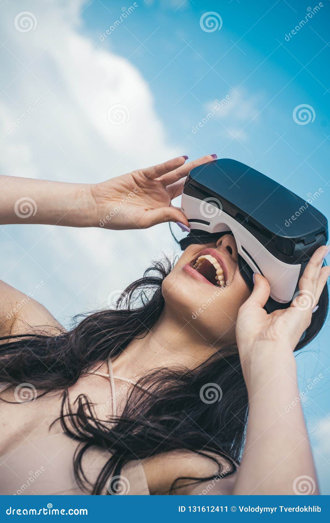 Happy Girl Getting Experience Using VR Headset Glasses Of 