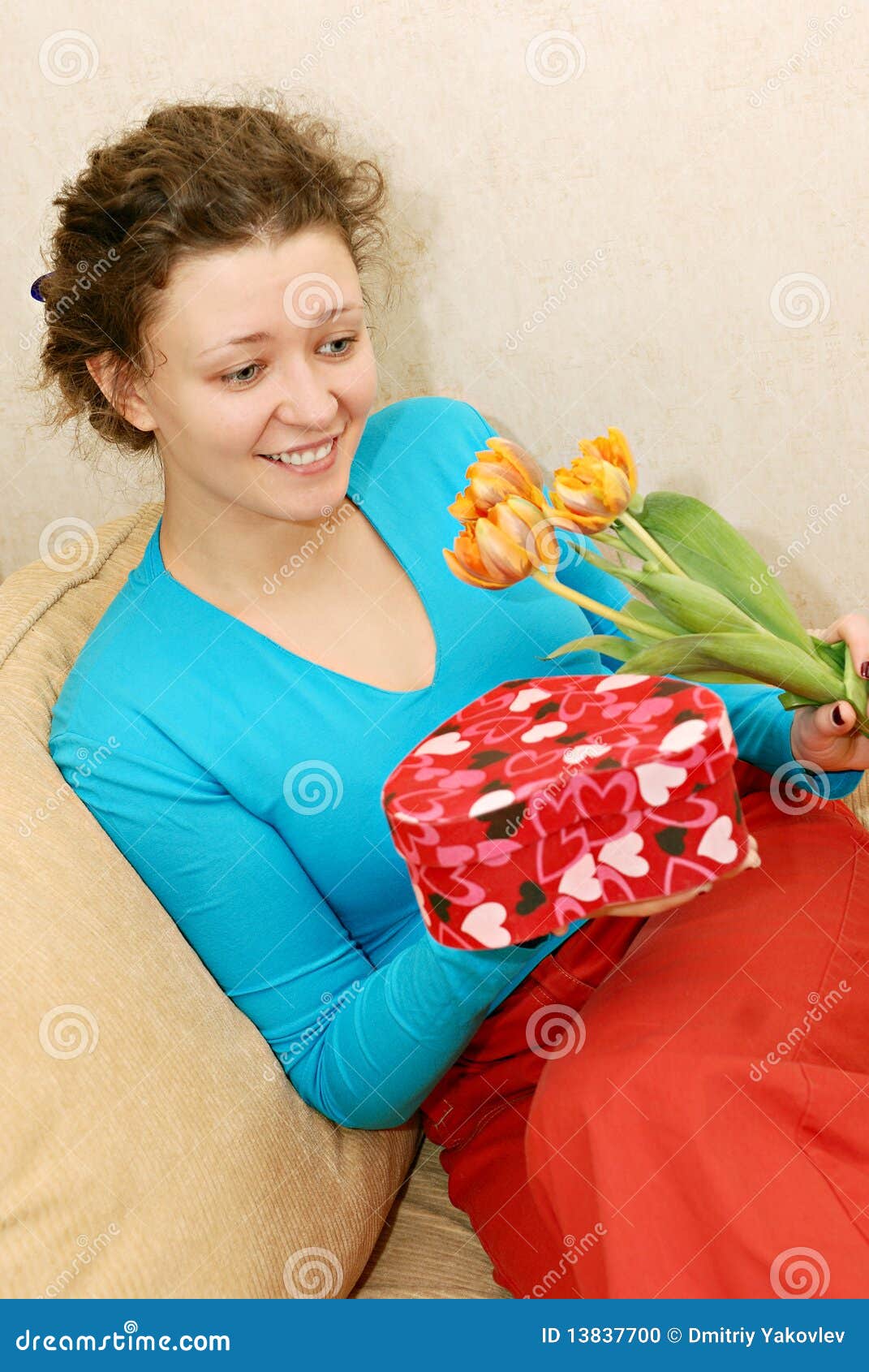Woman Getting Flowers and Gift Stock Photo Image of stereotypical