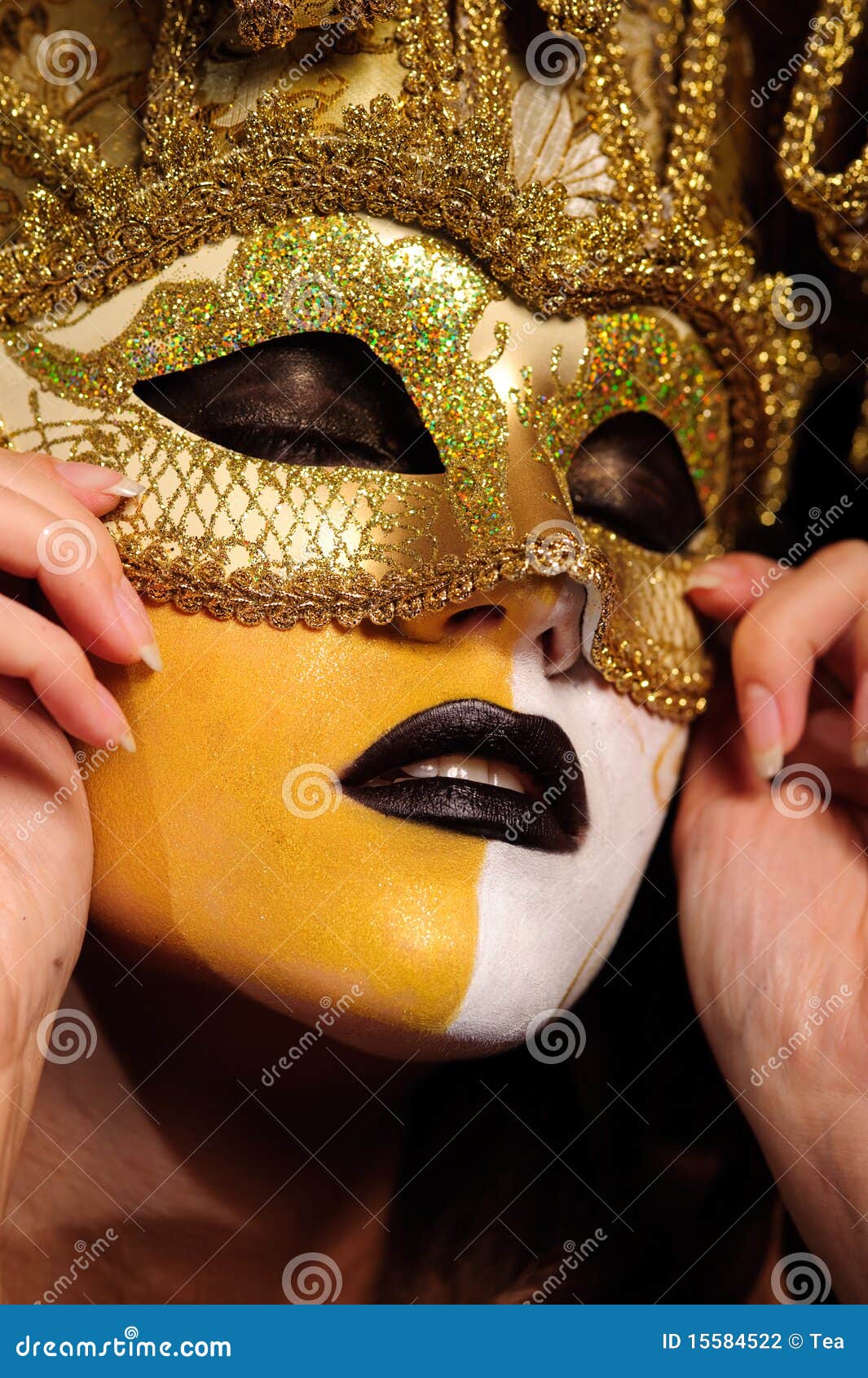 Woman in golden half mask stock photo. Image of erotic 15584522