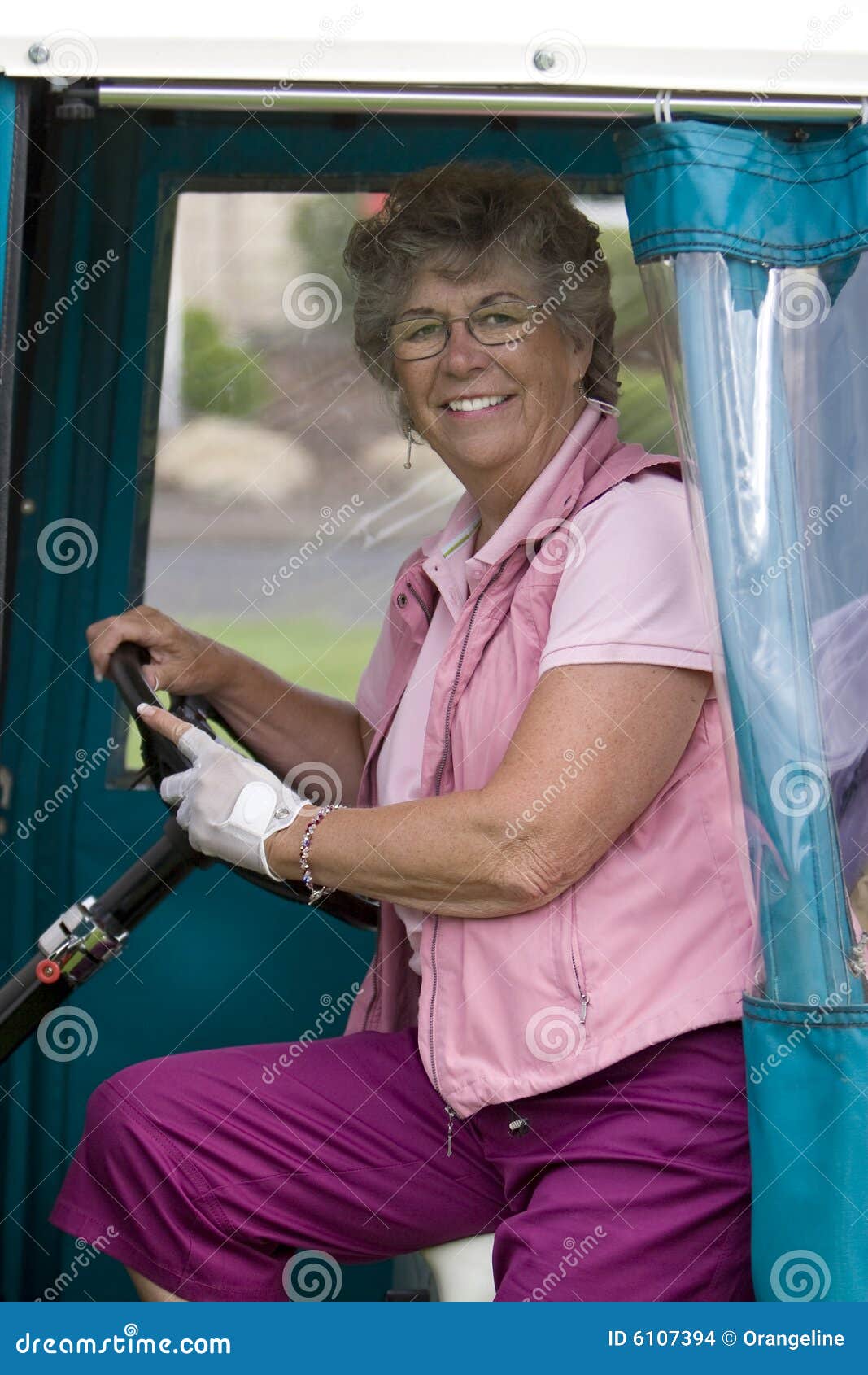 Woman in Golf Cart stock photo. Image of cheerful, smiling - 6107394