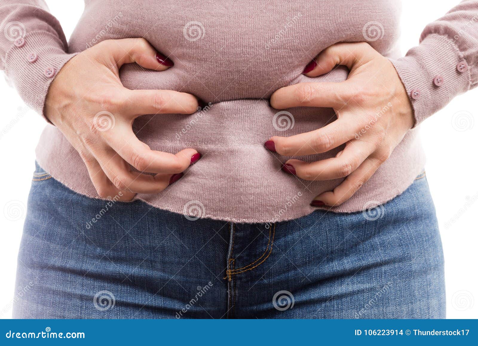 woman grabbing her belly as painful abdominal problem