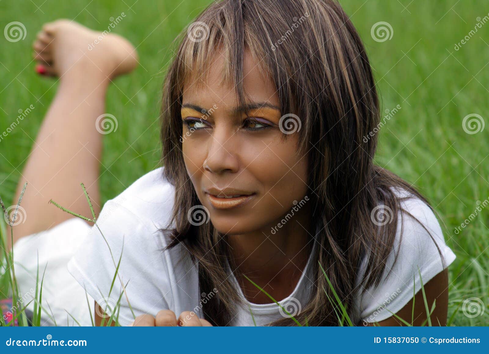 Woman In A Grassy Field (1) Stock Photo - Image of american ...