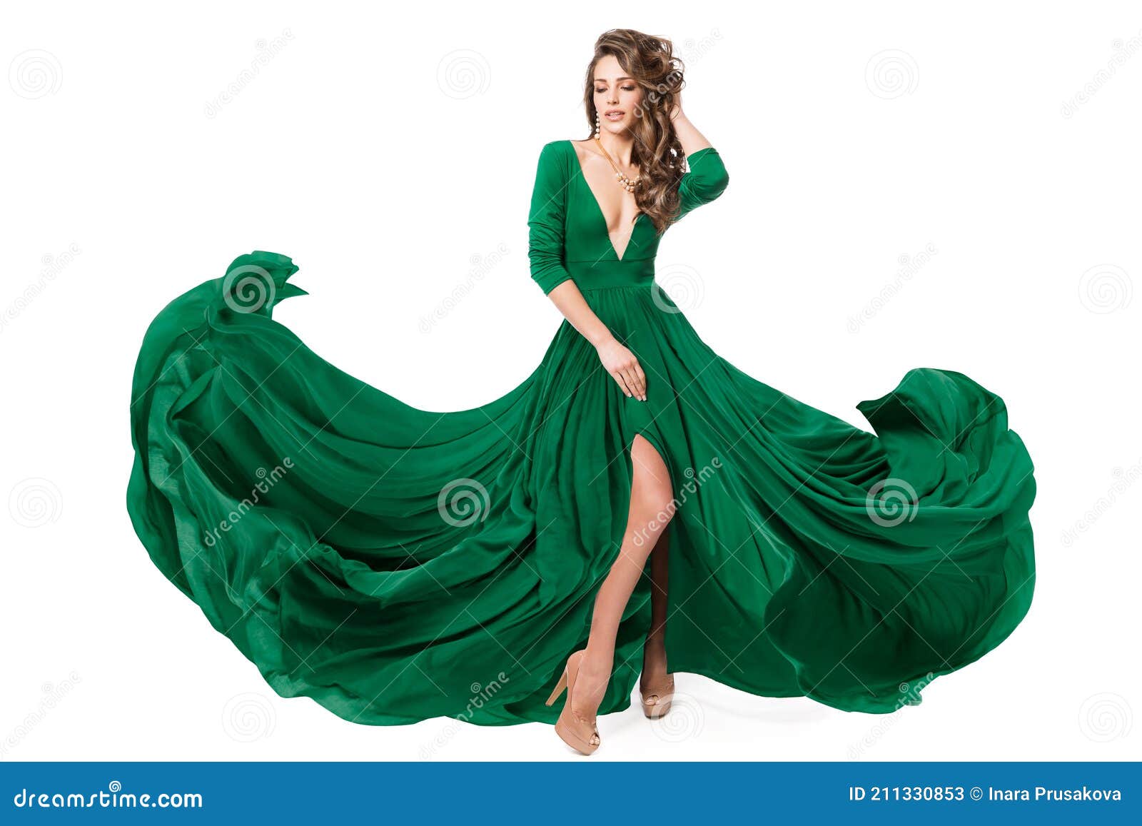 Woman Green Fashion Dress. Model in Long Evening Slit Gown Waving on ...