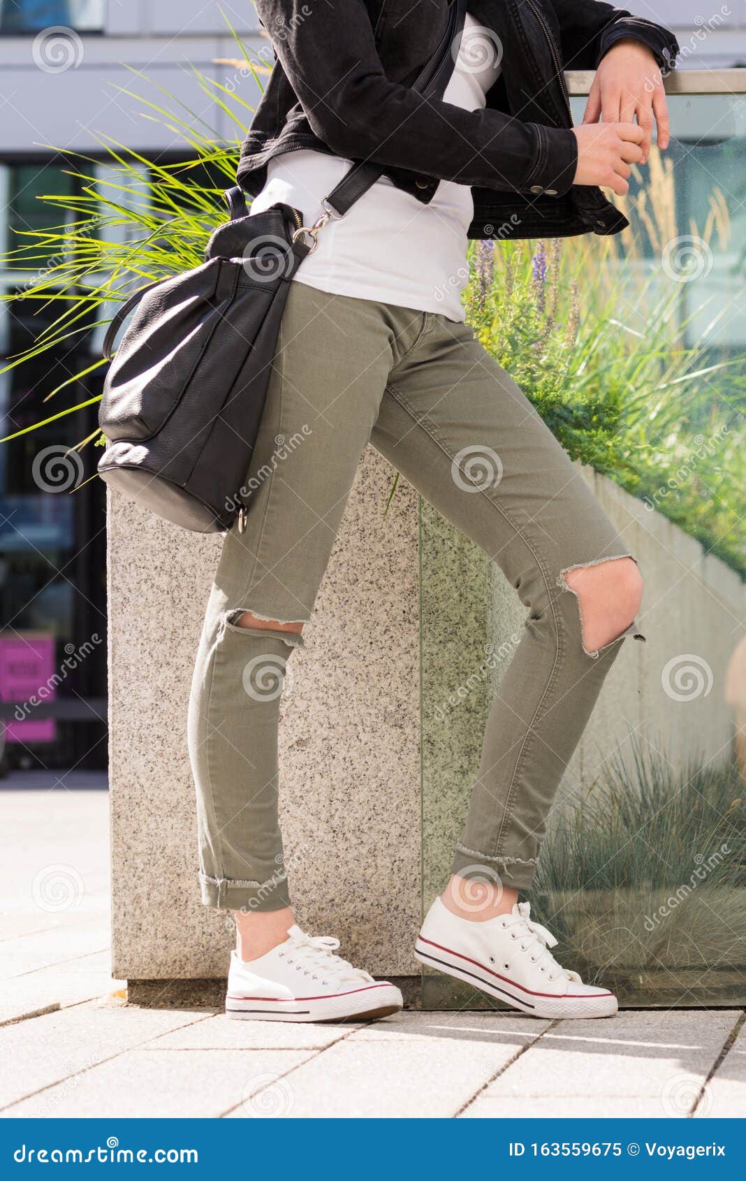 Woman in Green Trousers with Holes on Knees Stock Image - Image of ...
