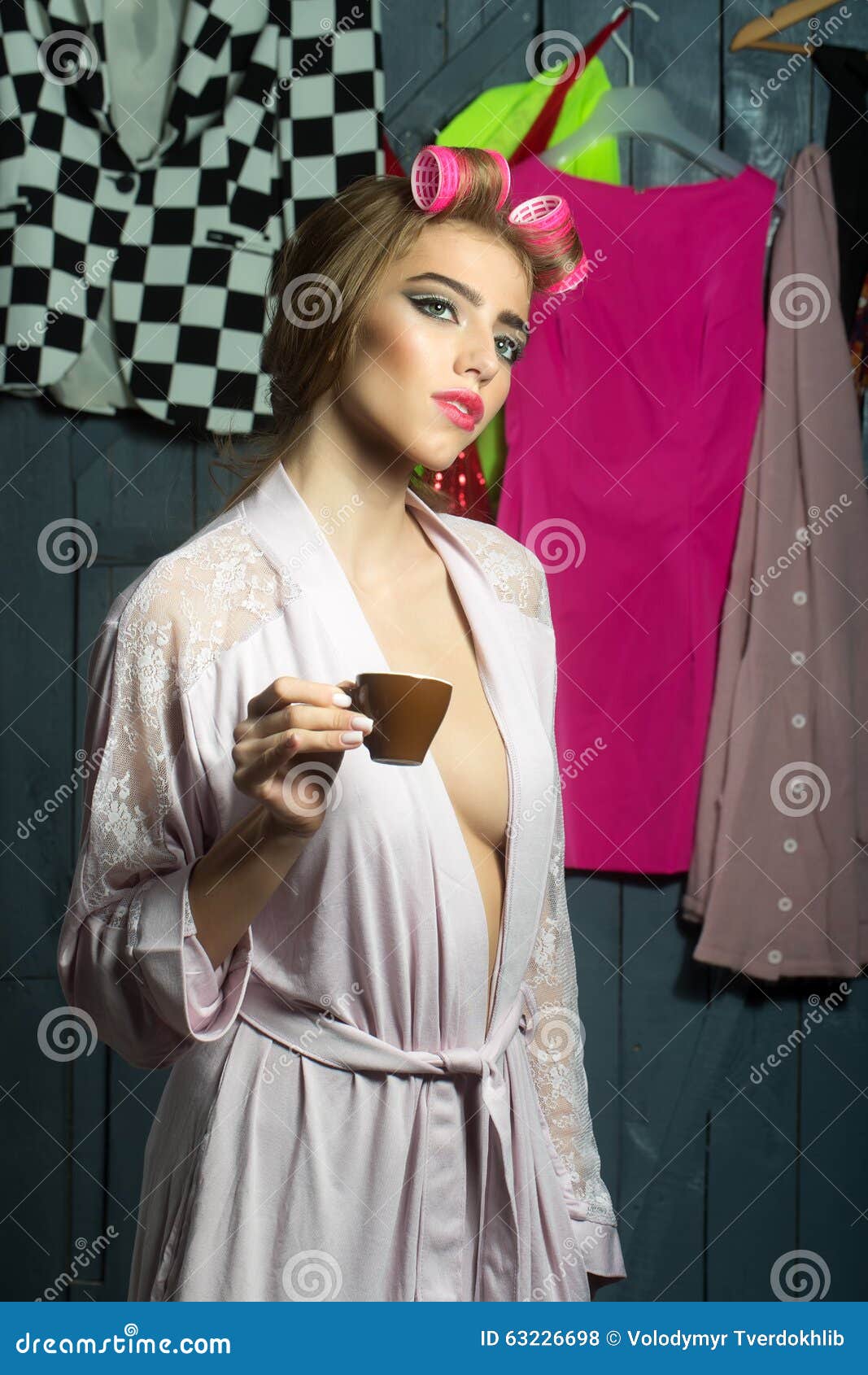 Woman with Hair-curlers and Coffee Stock Photo