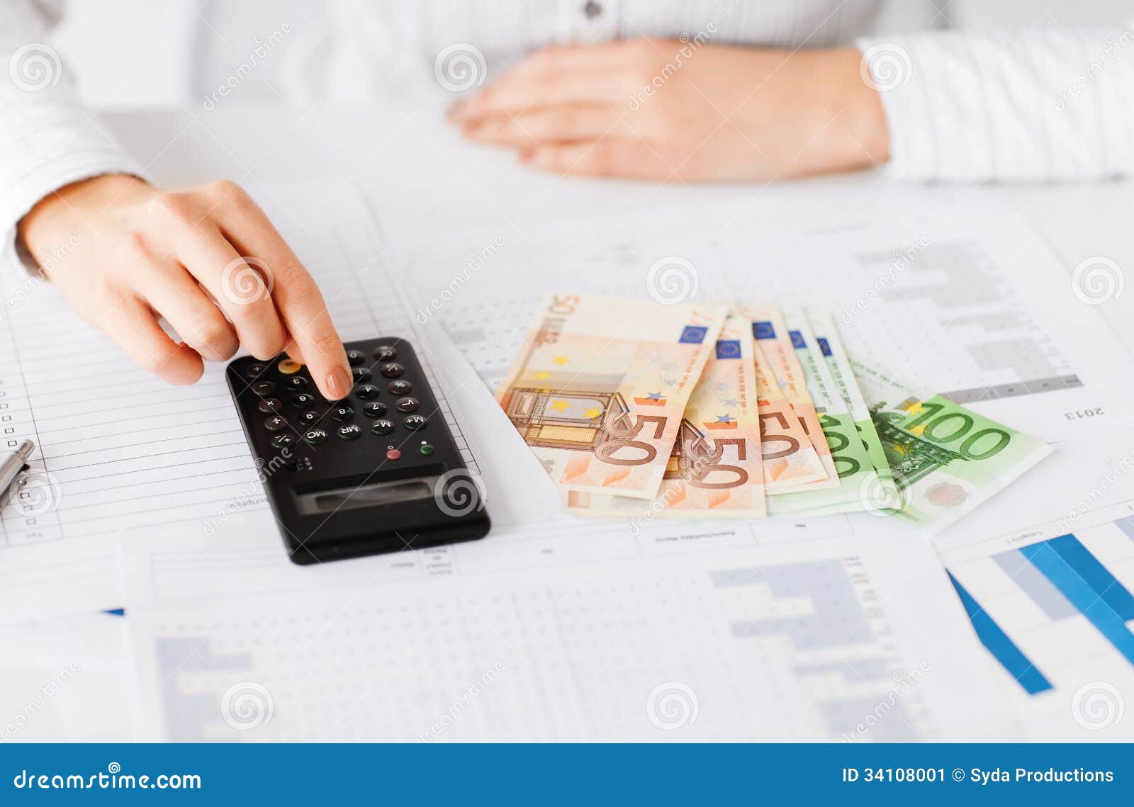 woman hand with calculator and euro money