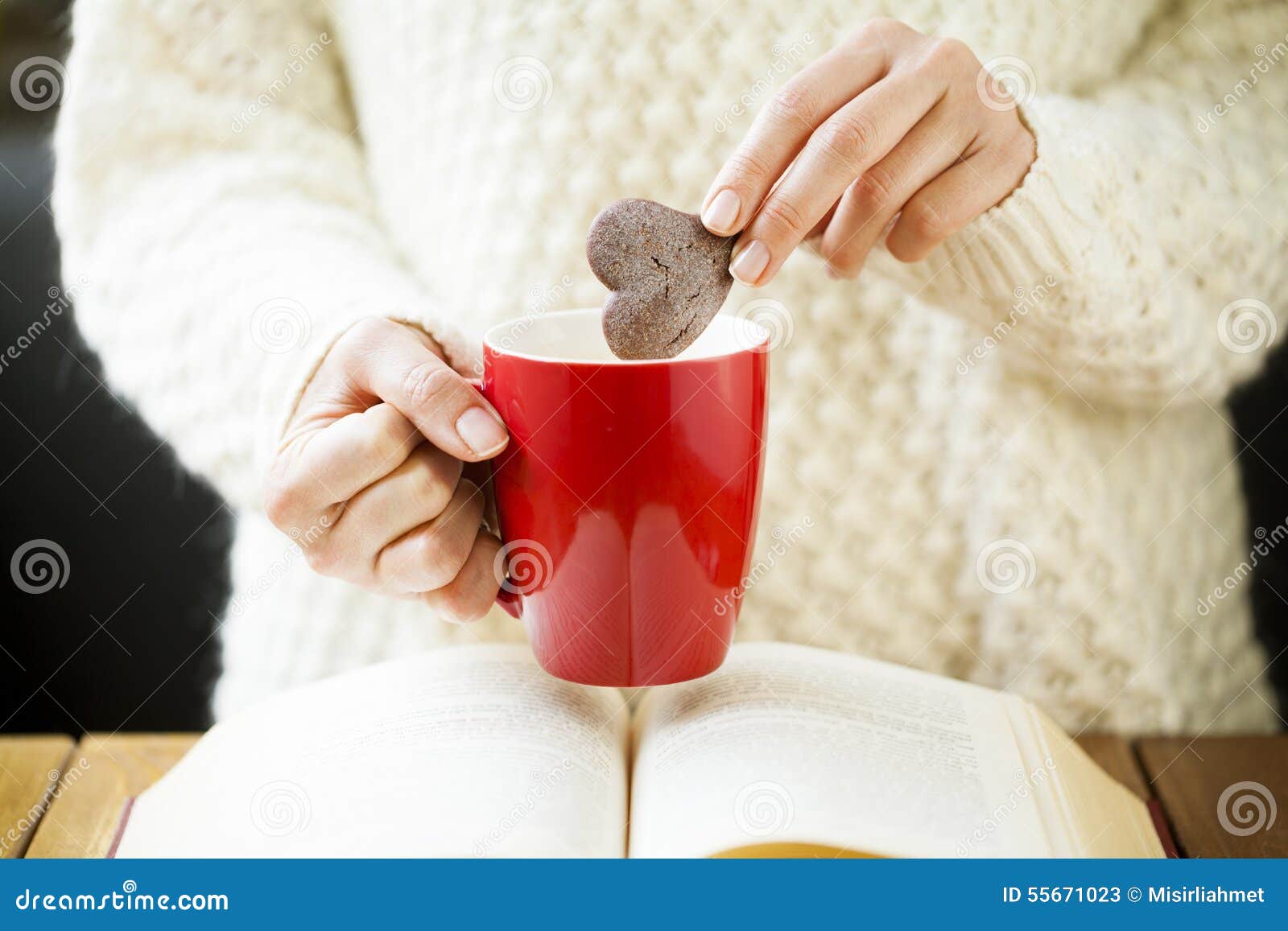 Woman Hand Dipping Cookie in Tea Stock Image Image of book, biscuit