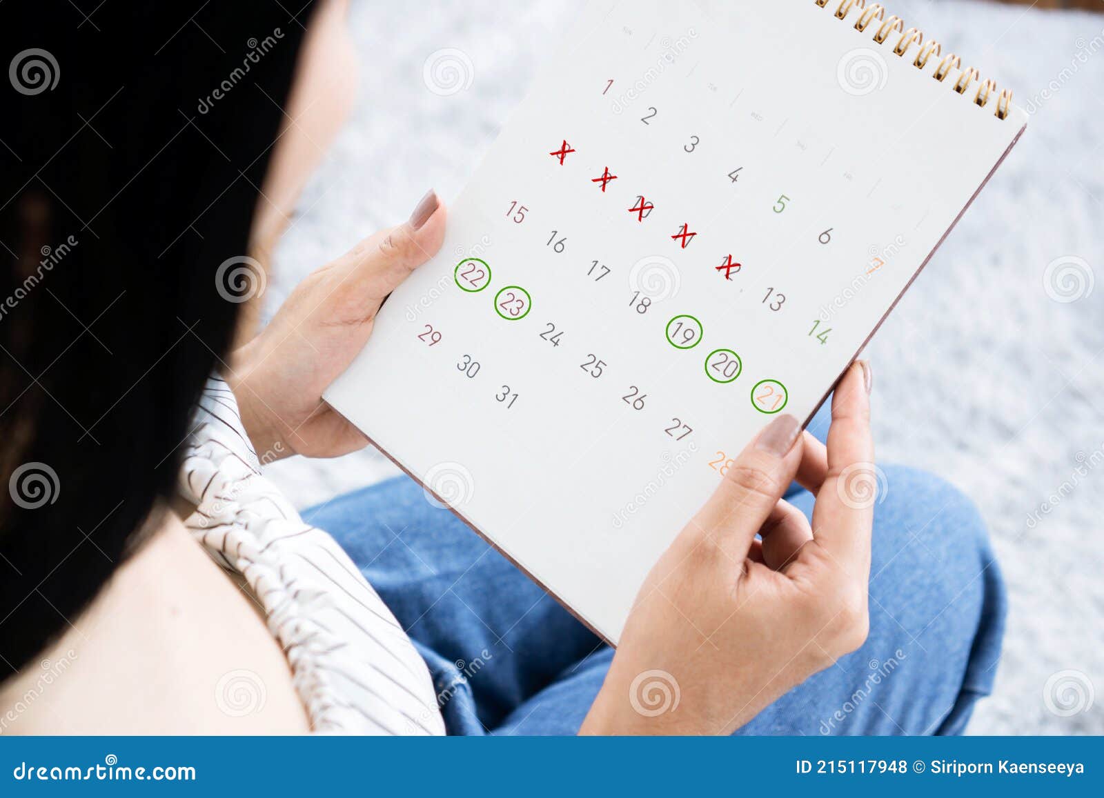 Asian Woman Hand Holding Calendar Counting The Date And Checking Her