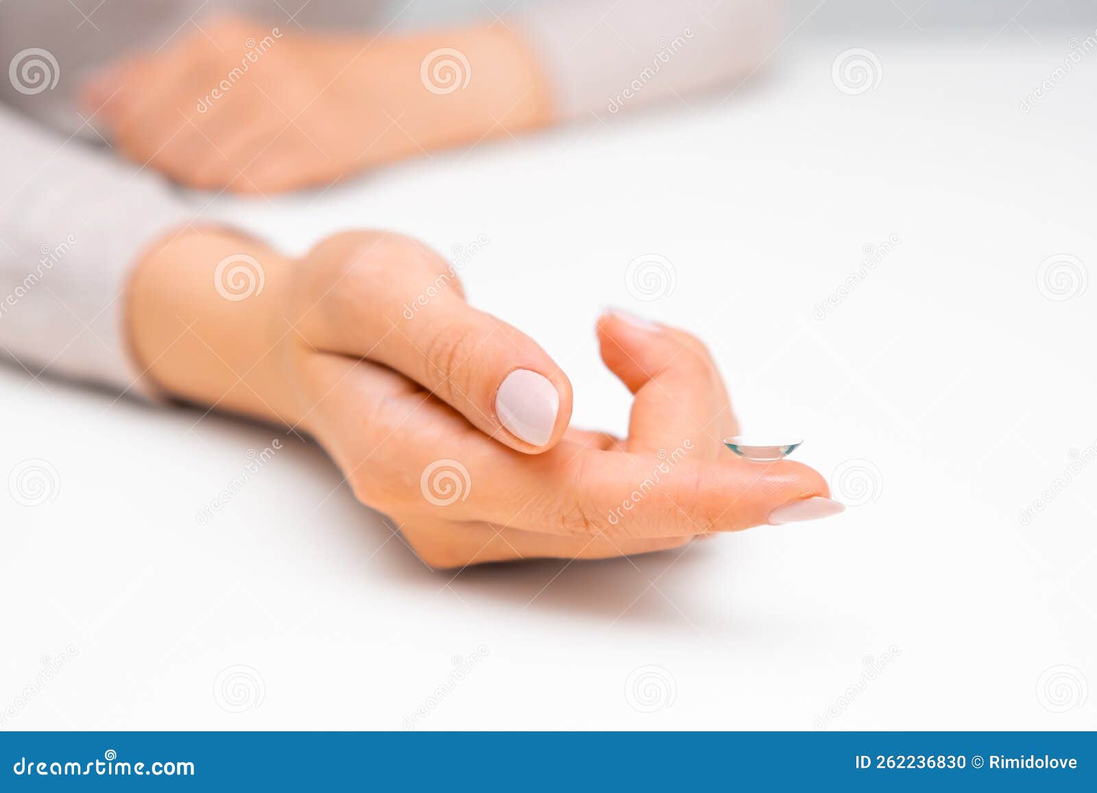 Woman Hand Holding Eye Contact on the White Surface Stock Photo Image of insert, female 262236830