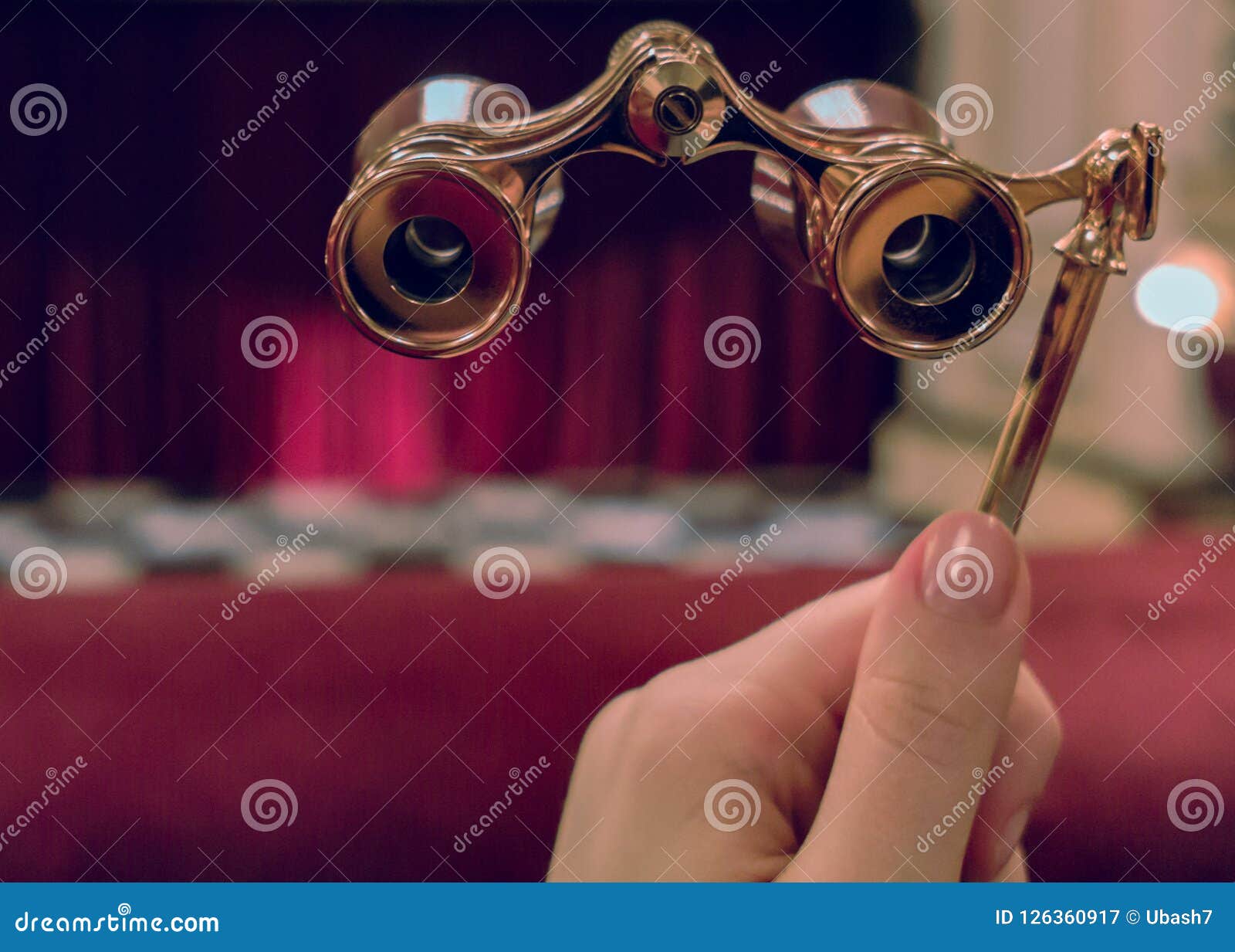 [Image: woman-hand-holds-opera-binocular-woman-h...360917.jpg]