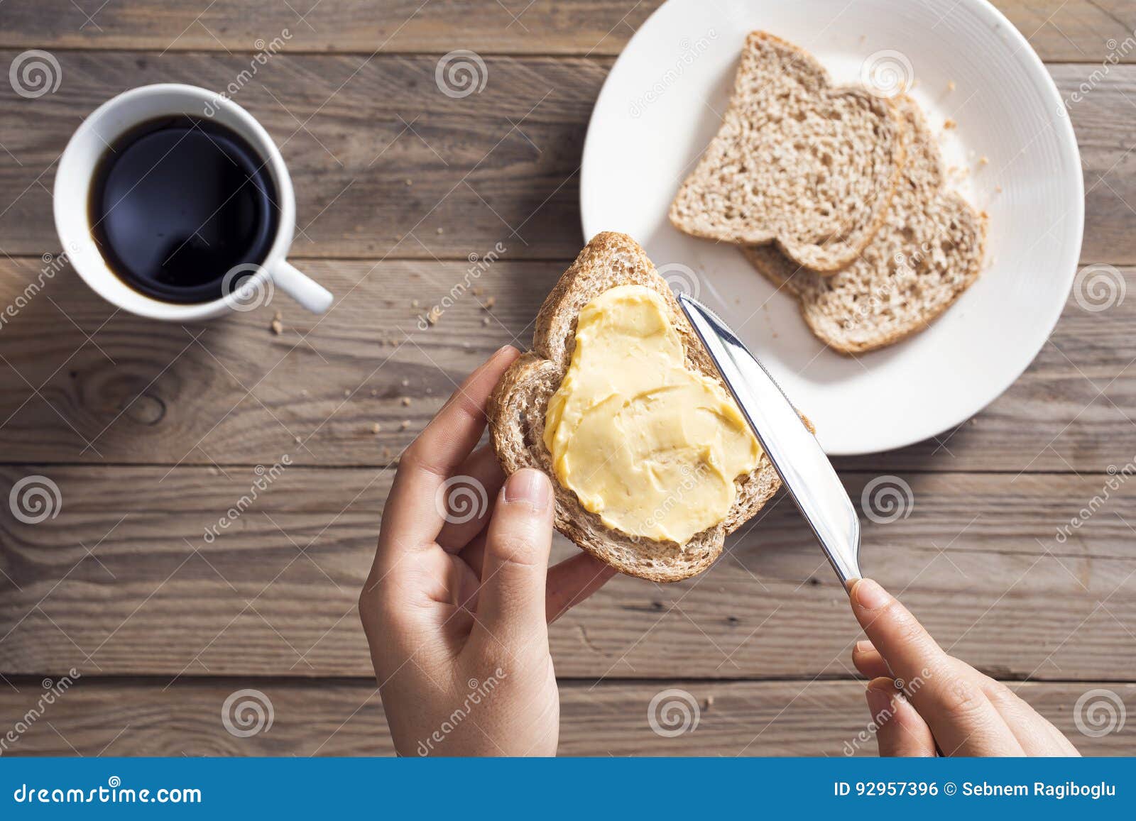 Woman Hand Spreading Butter on Sliced Bread Stock Photo Image of