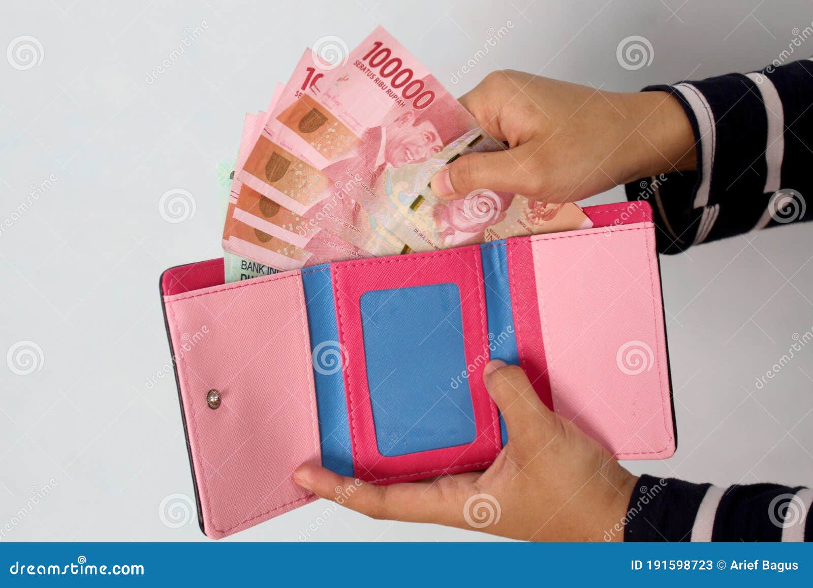 Woman Hand Take Out Showing Indonesian Rupiah Money From Pink Wallet ...