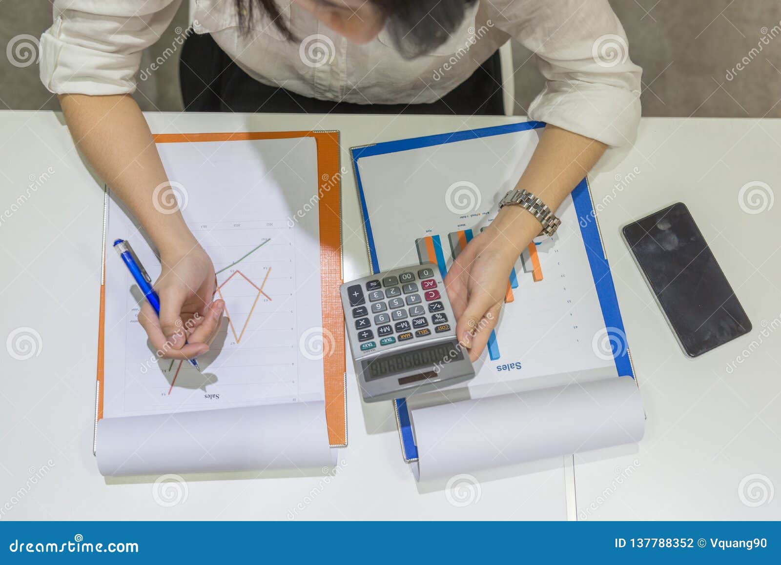 Woman Hand Using Calculator and Writing Stock Photo Image of laptop
