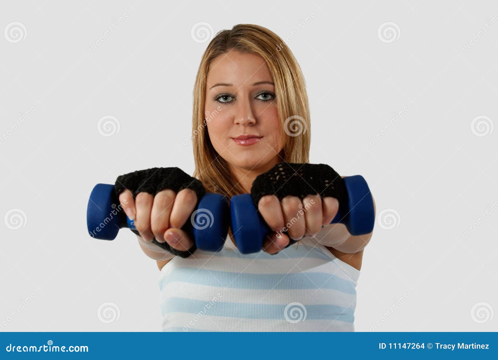 Woman with hand weights stock photo. Image of hands, female 11147264