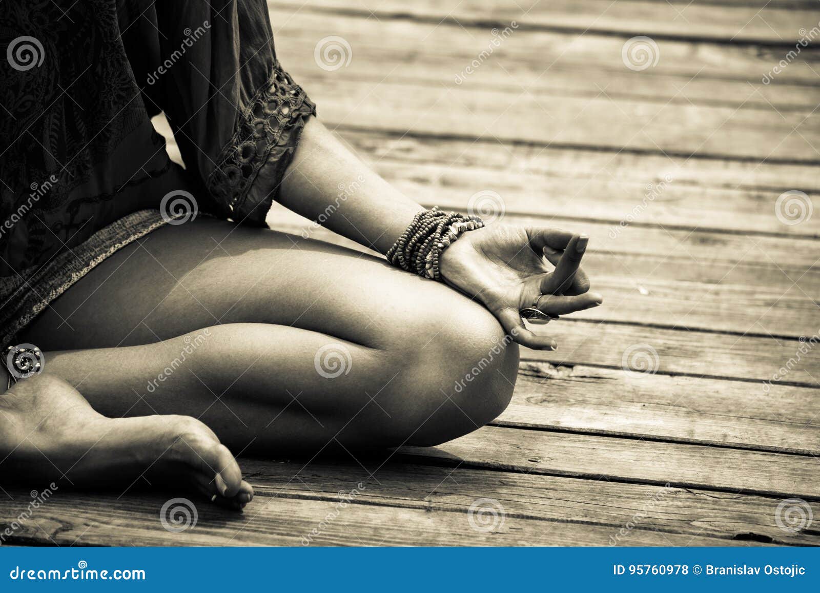 woman hand in yoga ic gesture mudra bw outdoor