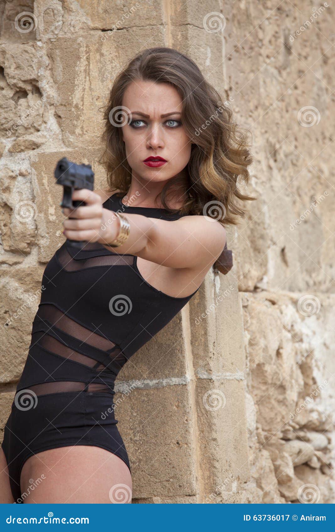 Woman with handgun aiming stock image. Image of beautiful 63736017