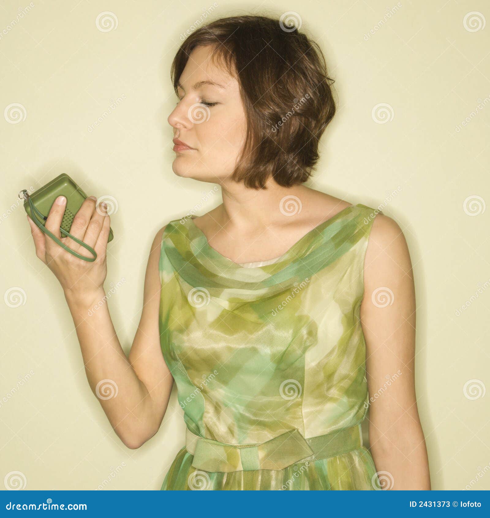 Woman with handheld radio. stock image. Image of retro 2431373
