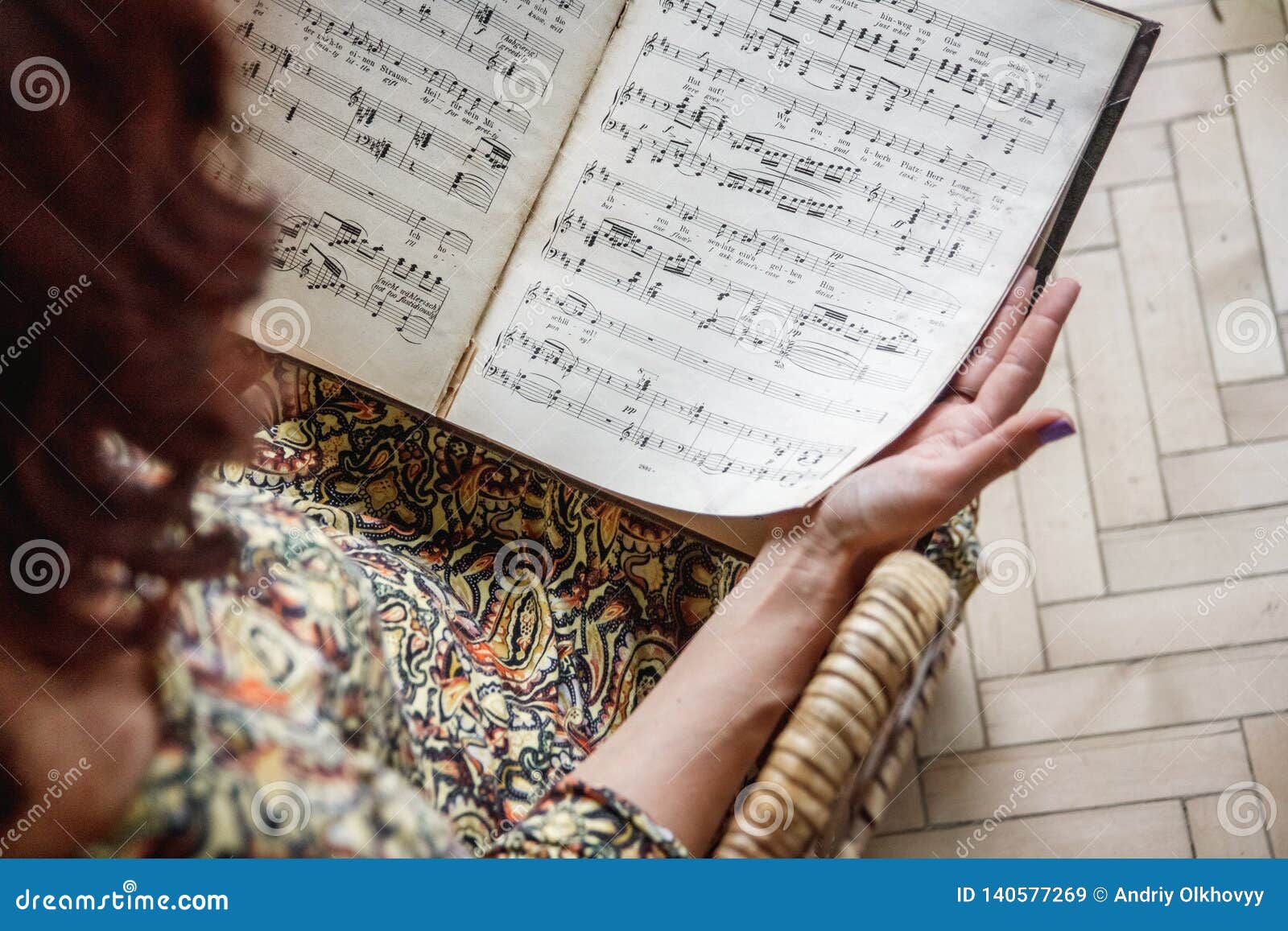 The Woman Hands Hold Piano Notes. Selective Focus Stock Image - Image ...