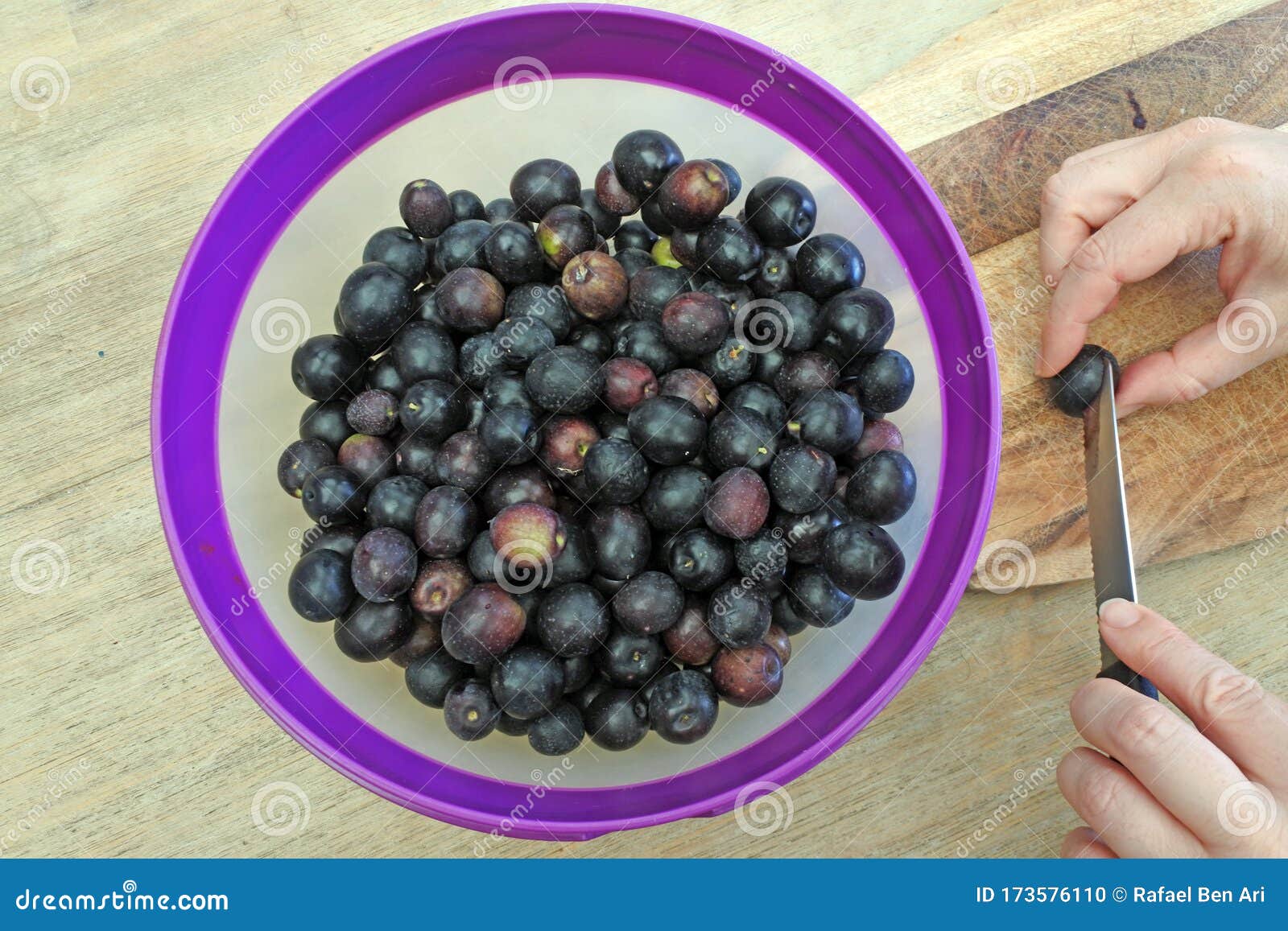 woman hands preparing manzanilla olives