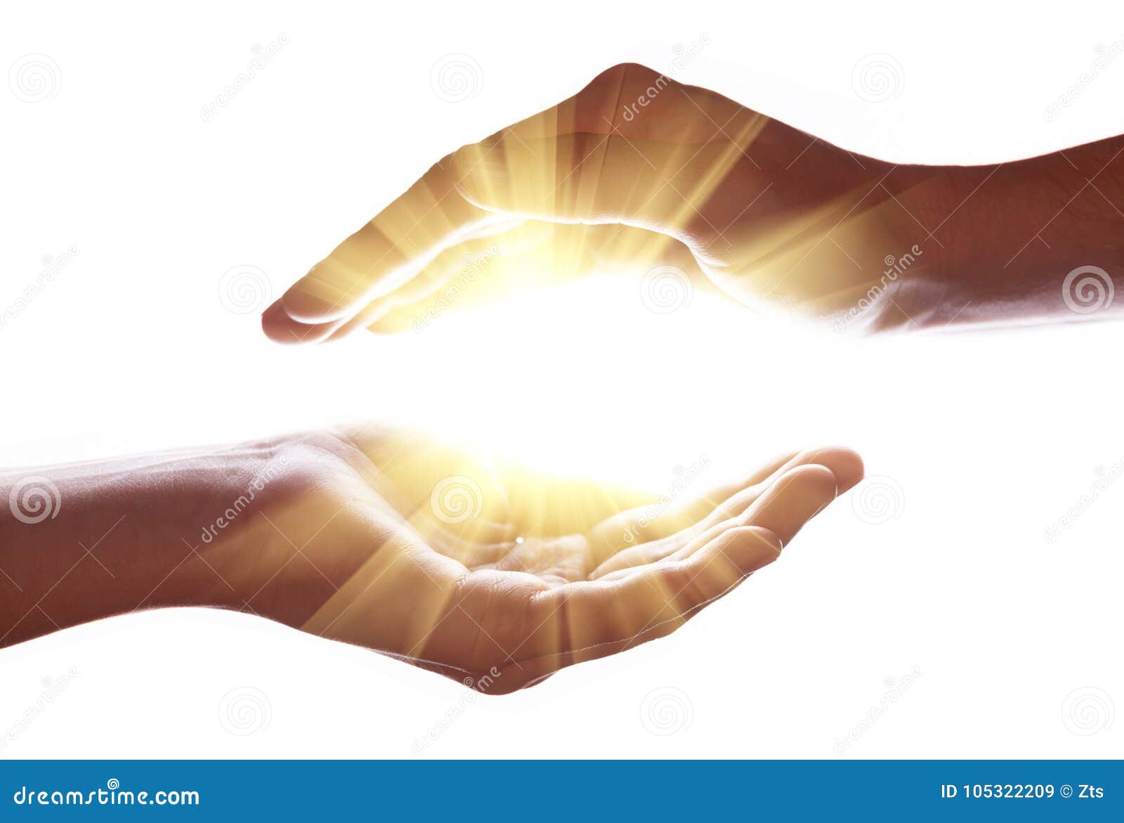 woman hands protecting and containing bright, glowing, radiant, shining light. emitting rays or beams expanding of center.