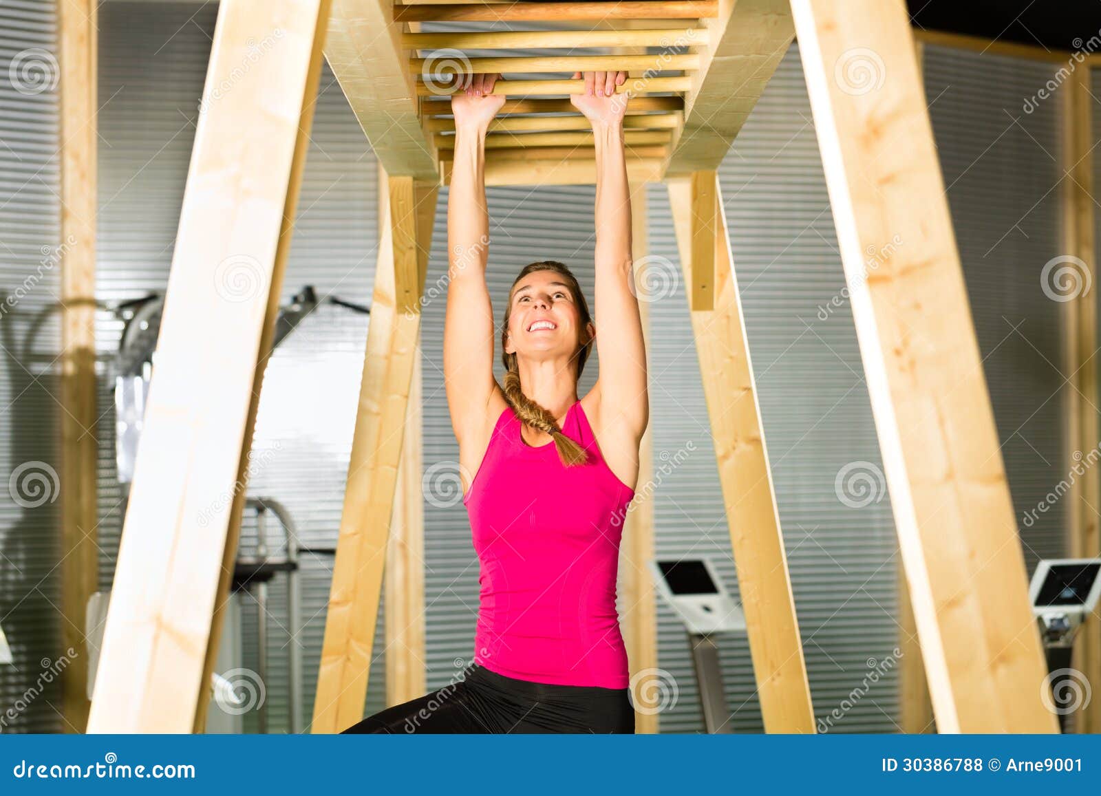 Woman Hanging At High Or Horizontal Bar Stock Photo - Image of high