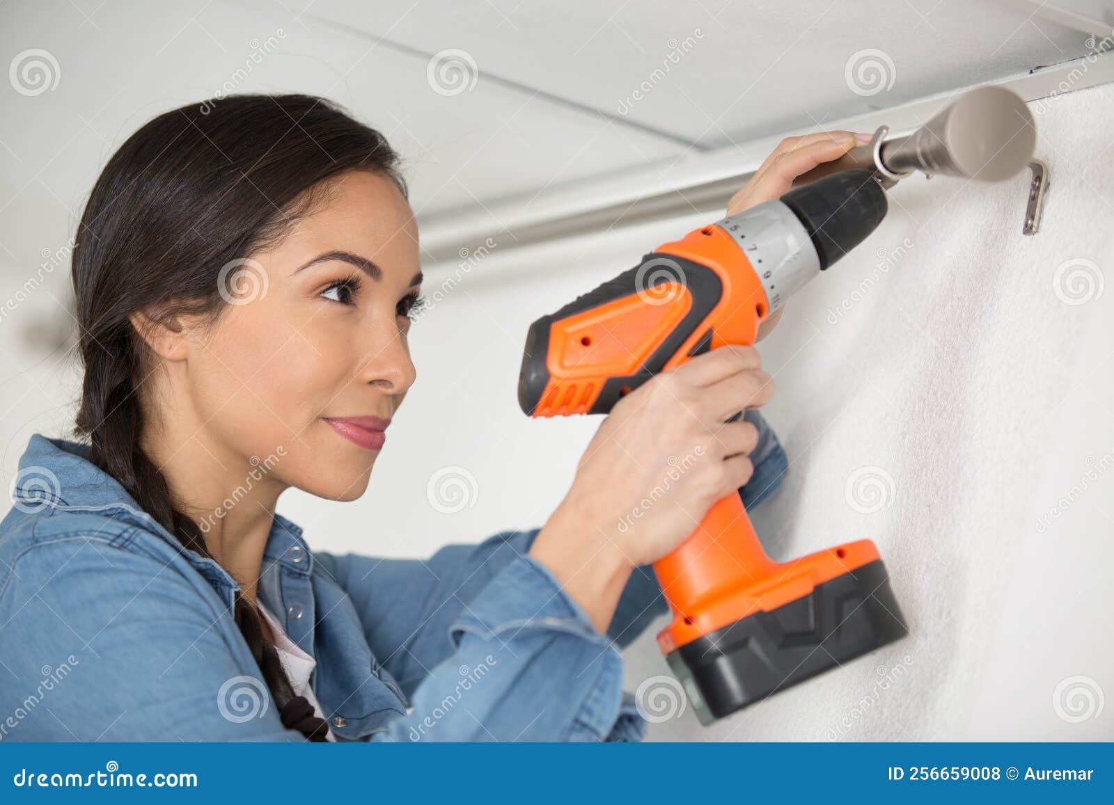 Woman Hanging Up Curtains at Window Stock Photo Image of domestic