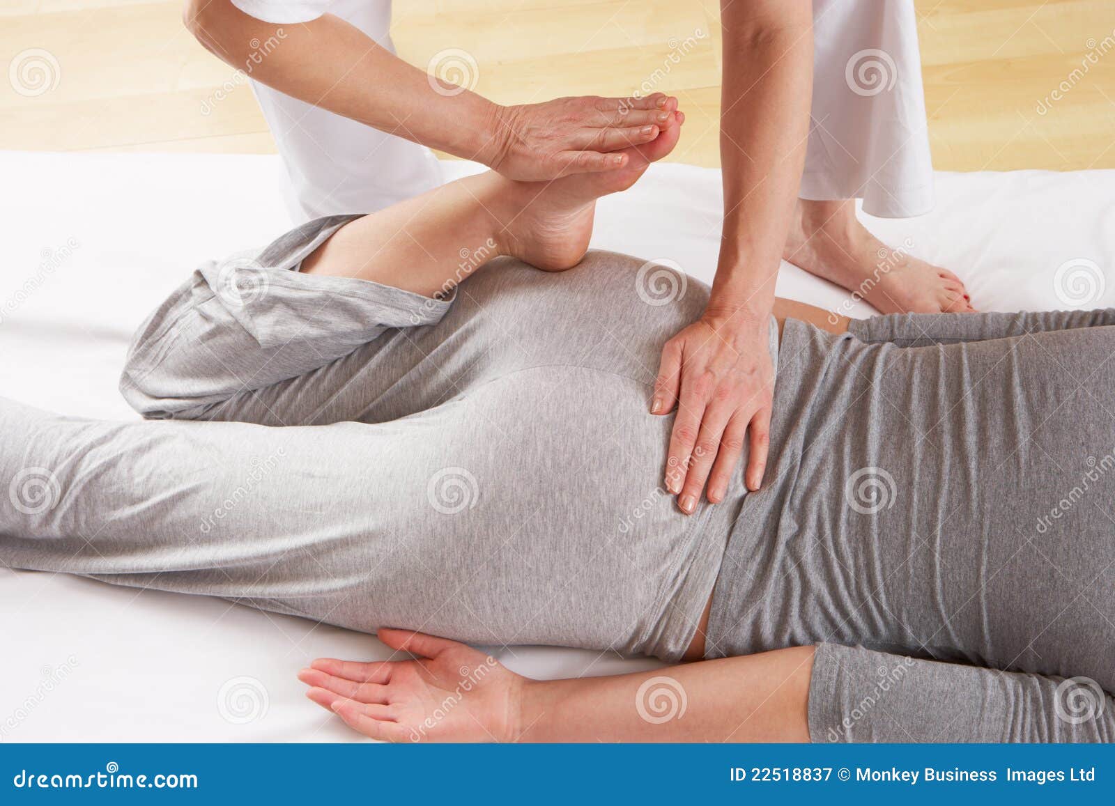 Lower back massage - Stock Image - C022/3243 - Science Photo Library