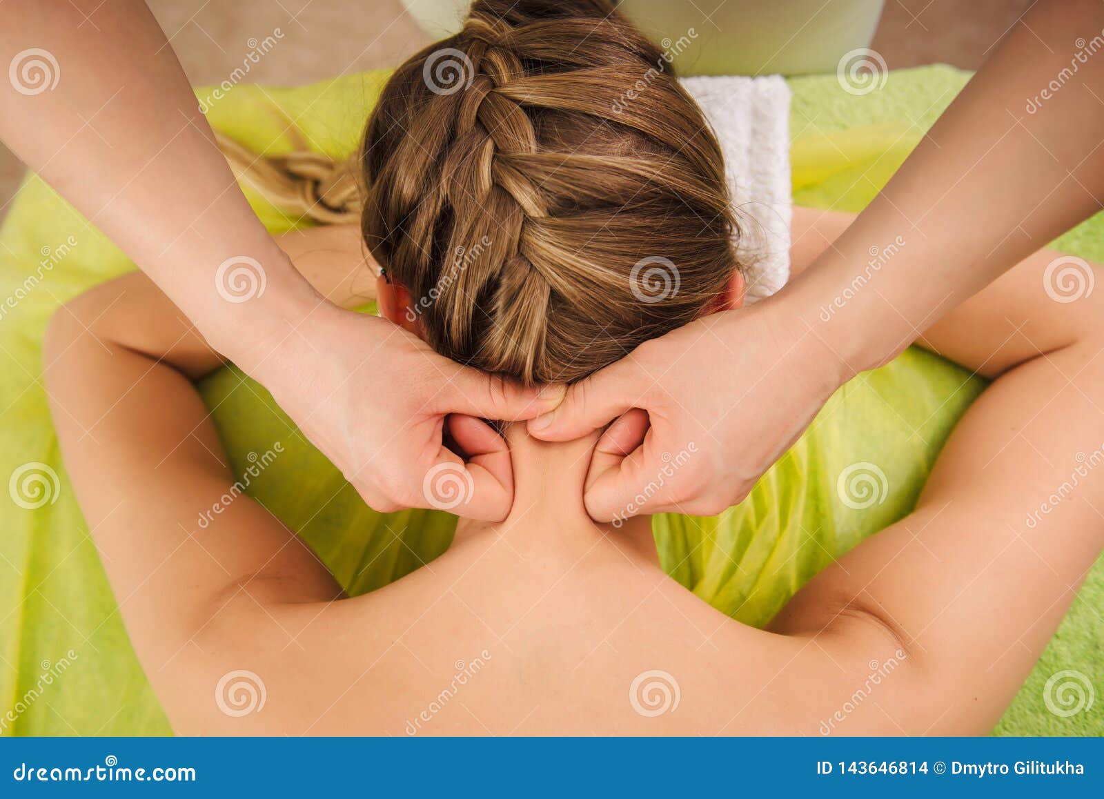 Woman Having Neck and Shoulder Massage in Spa Center Stock Photo