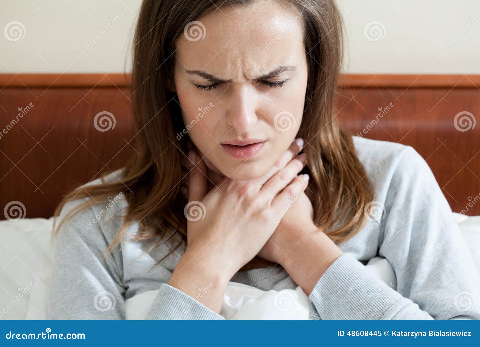 woman having a sore throat