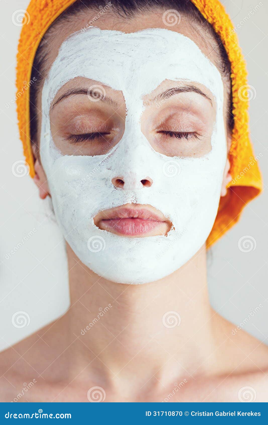 woman having a white smoothing face mask