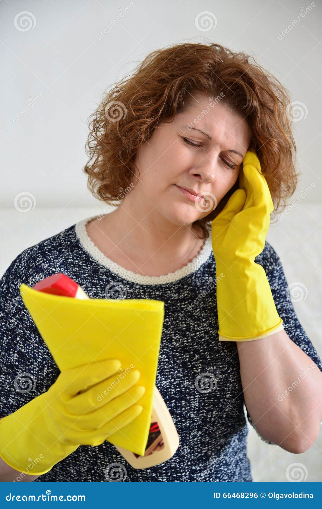 Woman with a Headache after Cleaning the House Stock Photo Image of