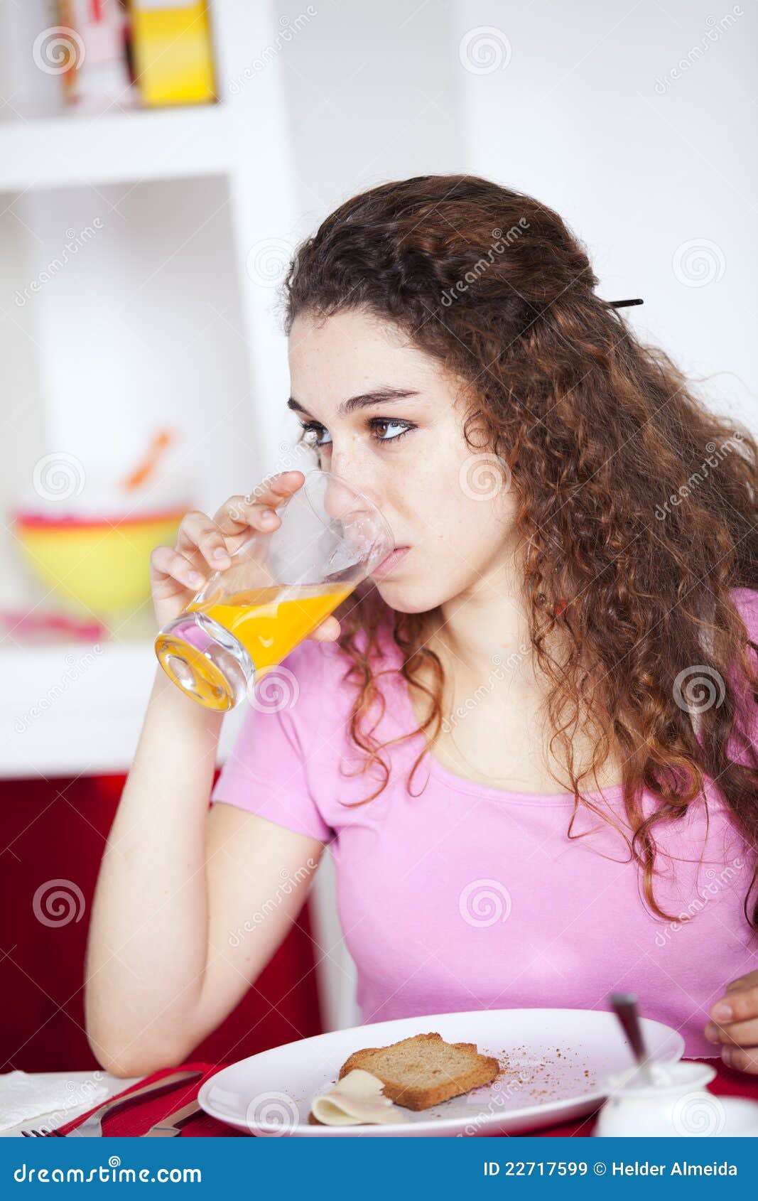 Woman at her breakfast stock image. Image of drinking - 22717599