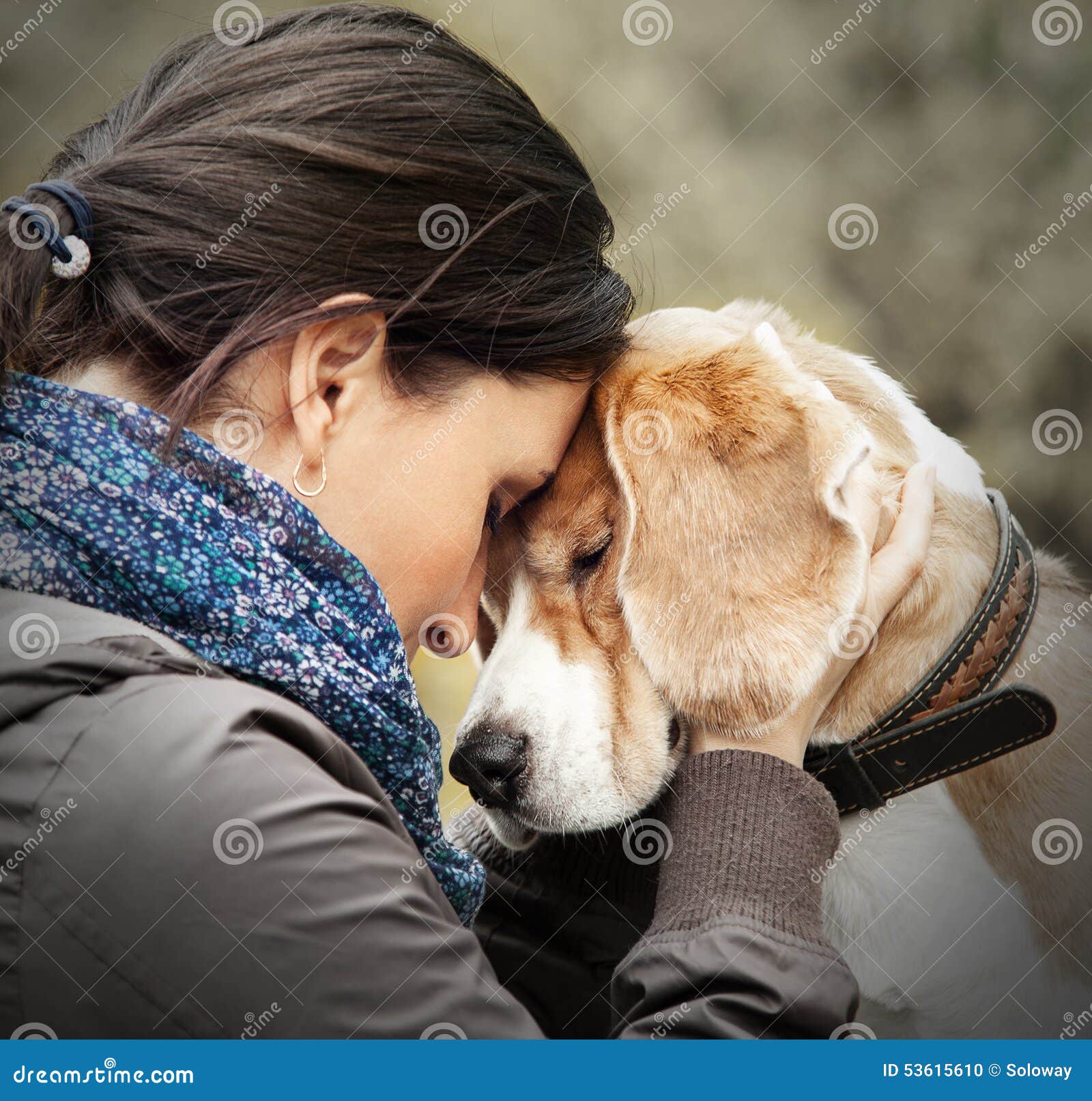 woman with her dog tender scene